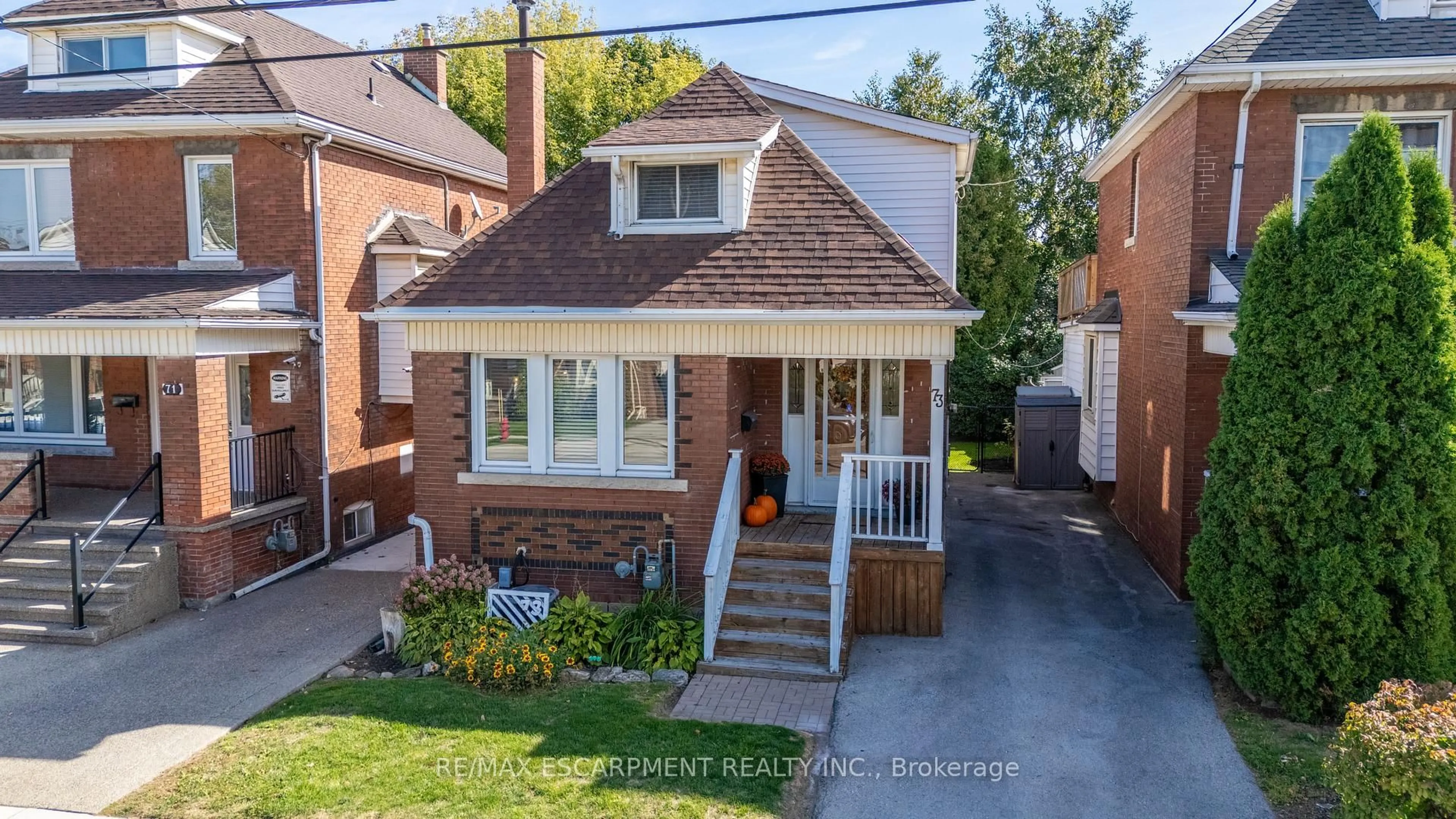 Home with brick exterior material, street for 73 Kenilworth Ave, Hamilton Ontario L8K 2T1