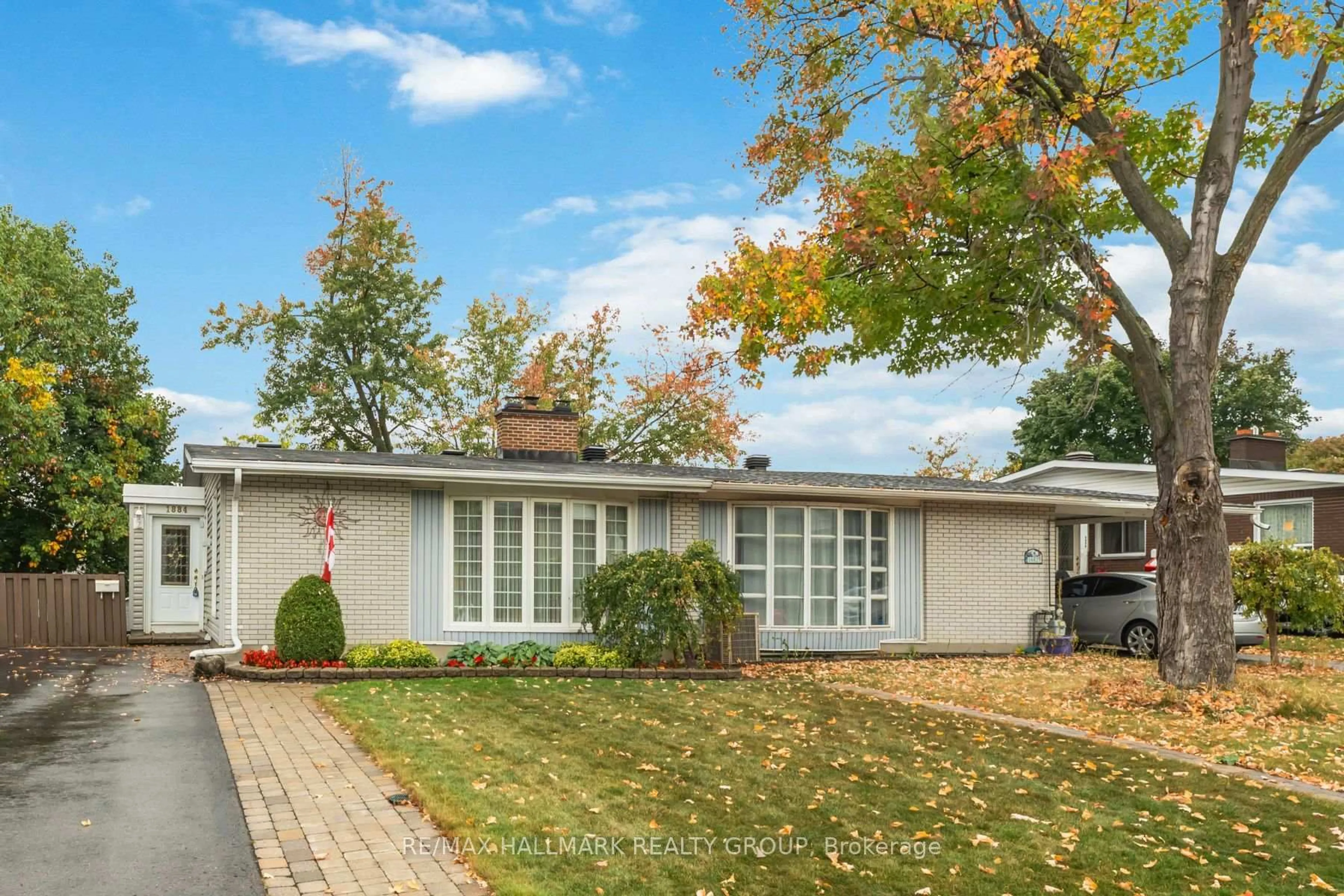 Home with vinyl exterior material, street for 1884 Elmridge Dr, Ottawa Ontario K1J 6R7