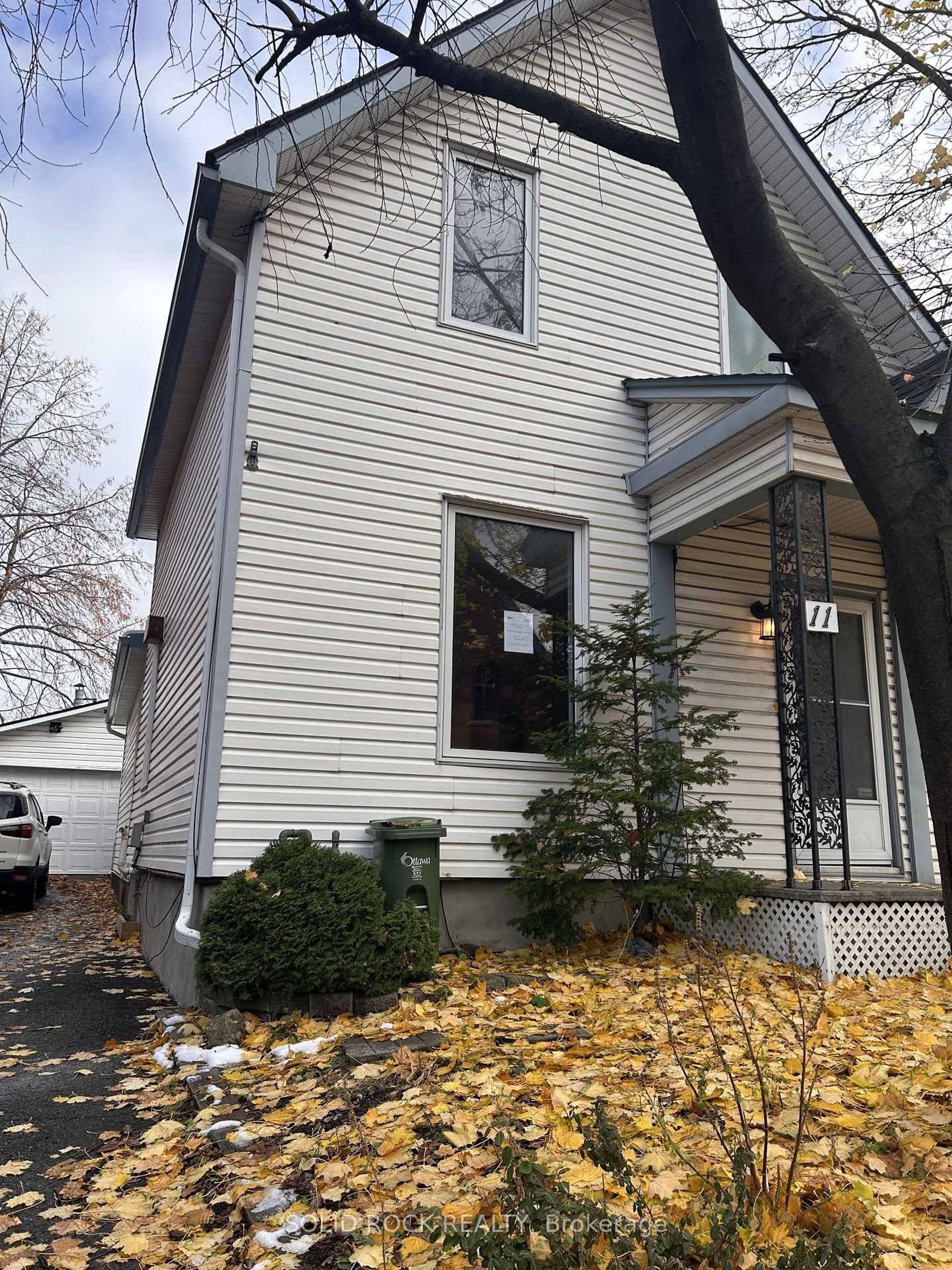 Home with vinyl exterior material, street for 11 Melrose Ave, Ottawa Ontario K1Y 1T8