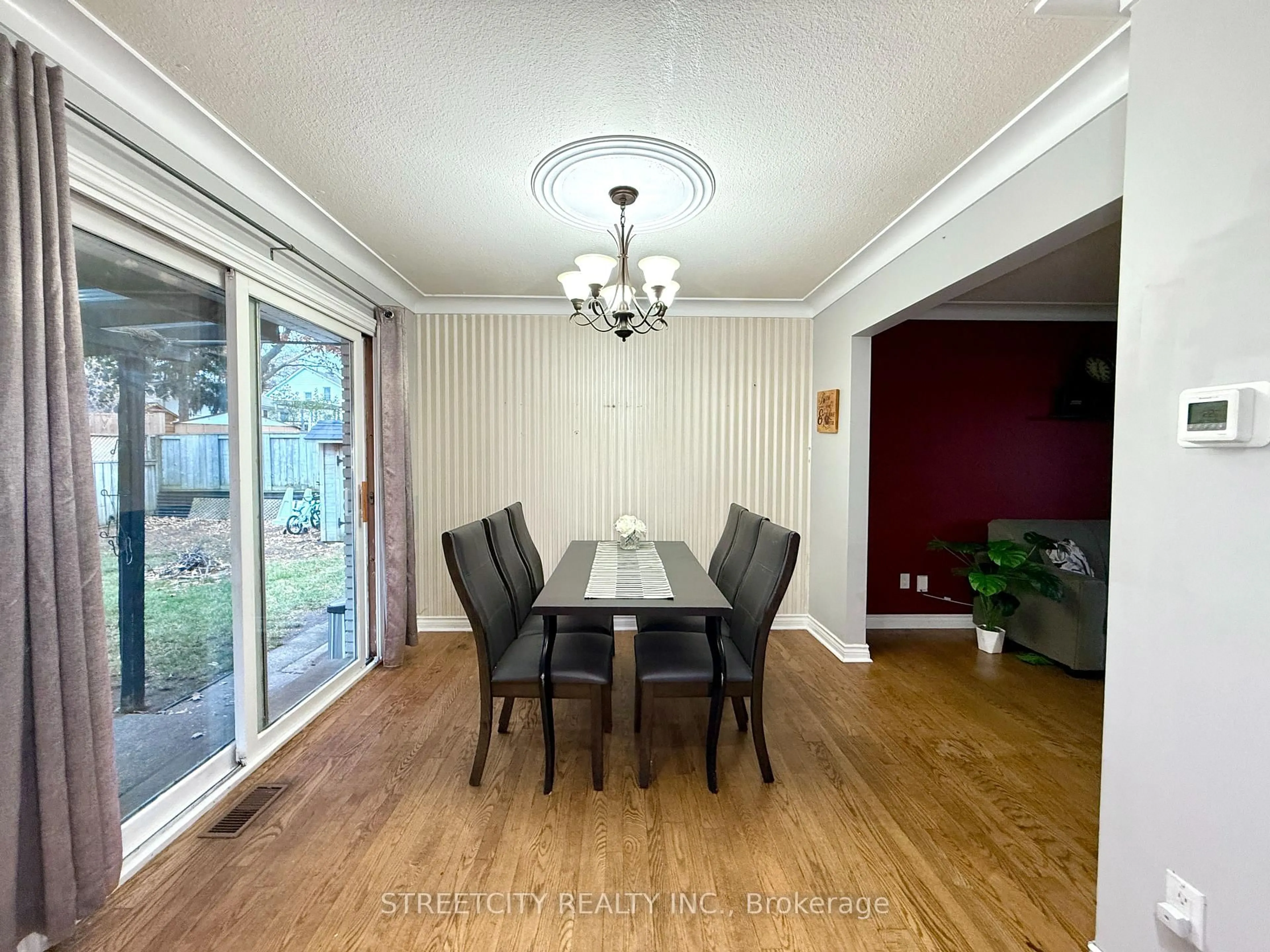 Dining room, wood/laminate floor for 1508 Len Ave, Sarnia Ontario N7S 3N1