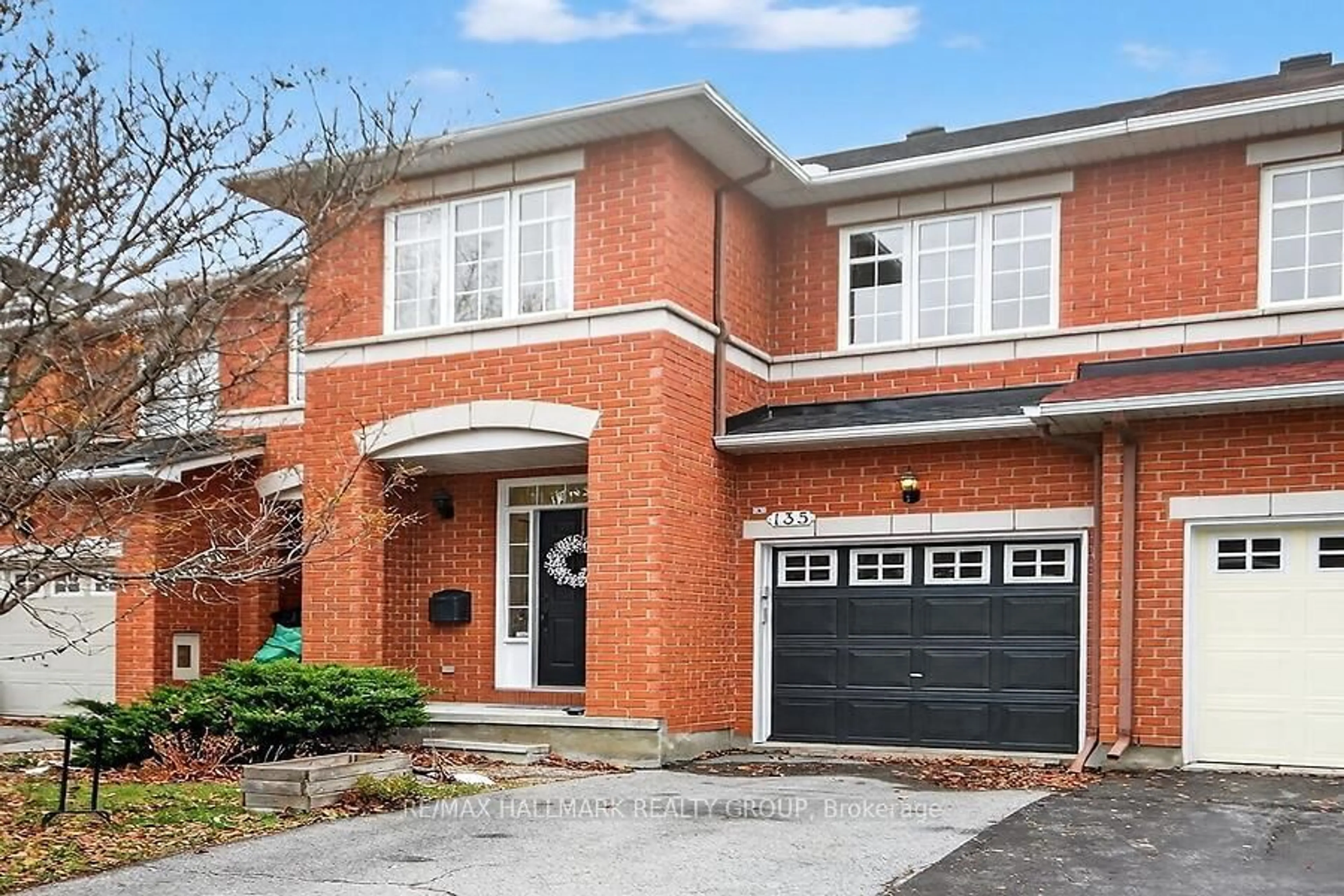 Home with brick exterior material, street for 135 Gatespark Private, Ottawa Ontario K2T 1L1