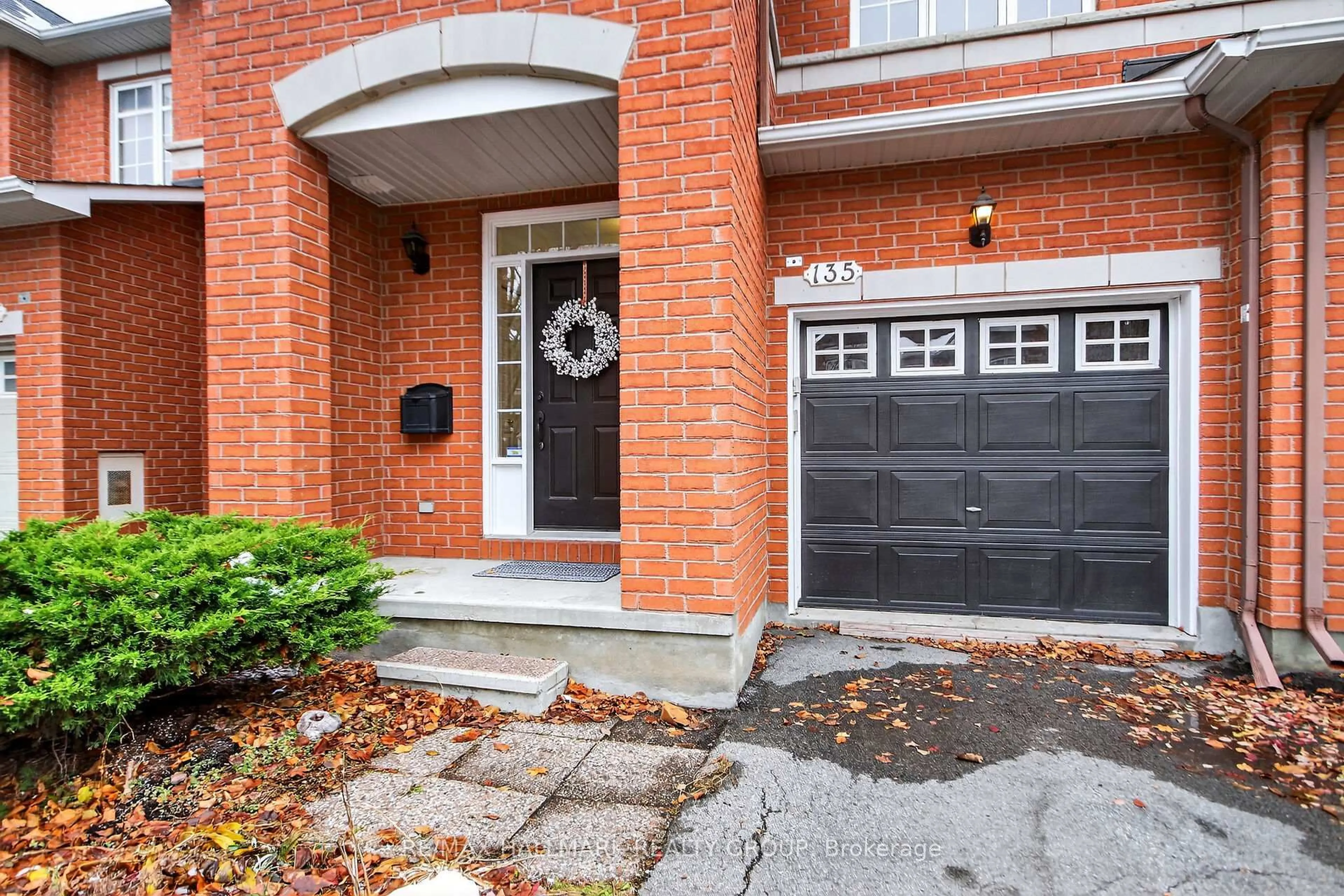 Home with brick exterior material, street for 135 Gatespark Private, Ottawa Ontario K2T 1L1