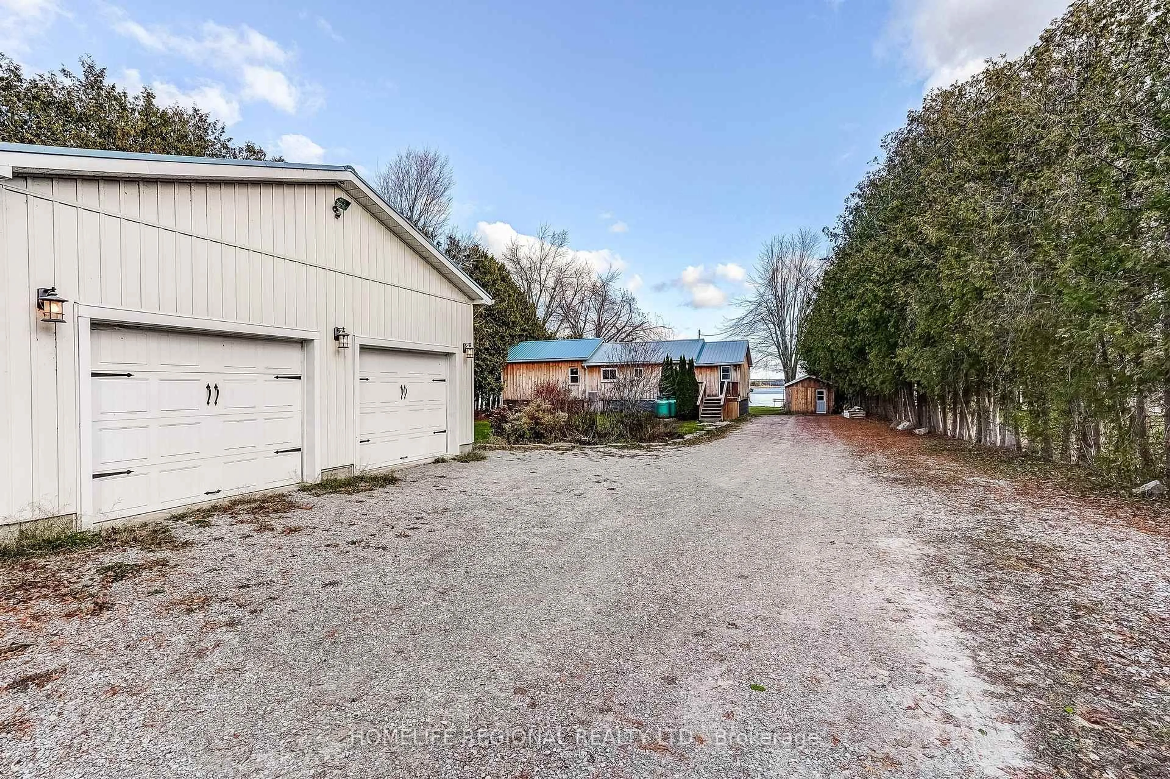A pic from outside/outdoor area/front of a property/back of a property/a pic from drone, street for 130 Crawford Rd, Kawartha Lakes Ontario L0K 1B0