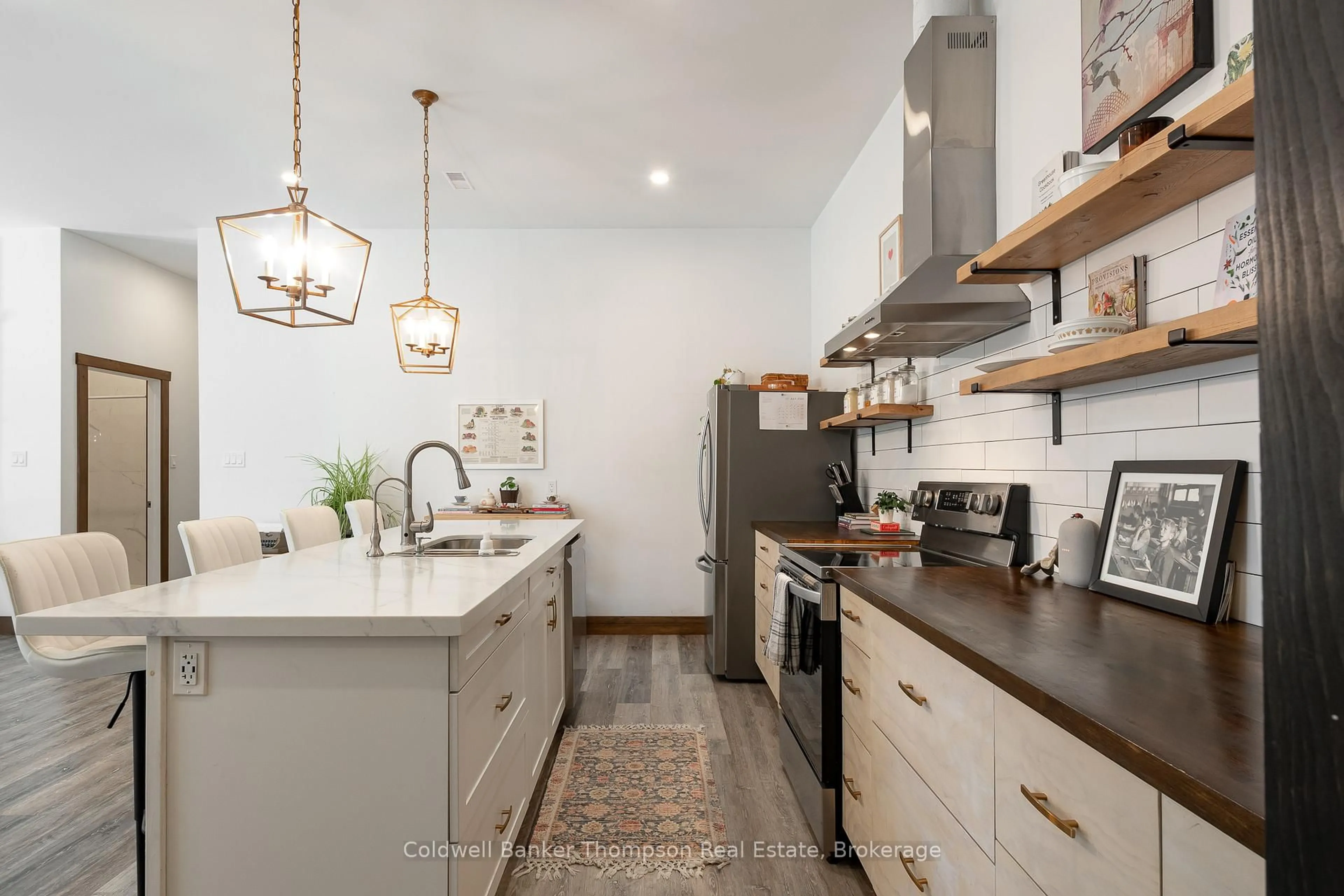 Open concept kitchen, ceramic/tile floor for 13 Lewis St, South River Ontario P0A 1X0