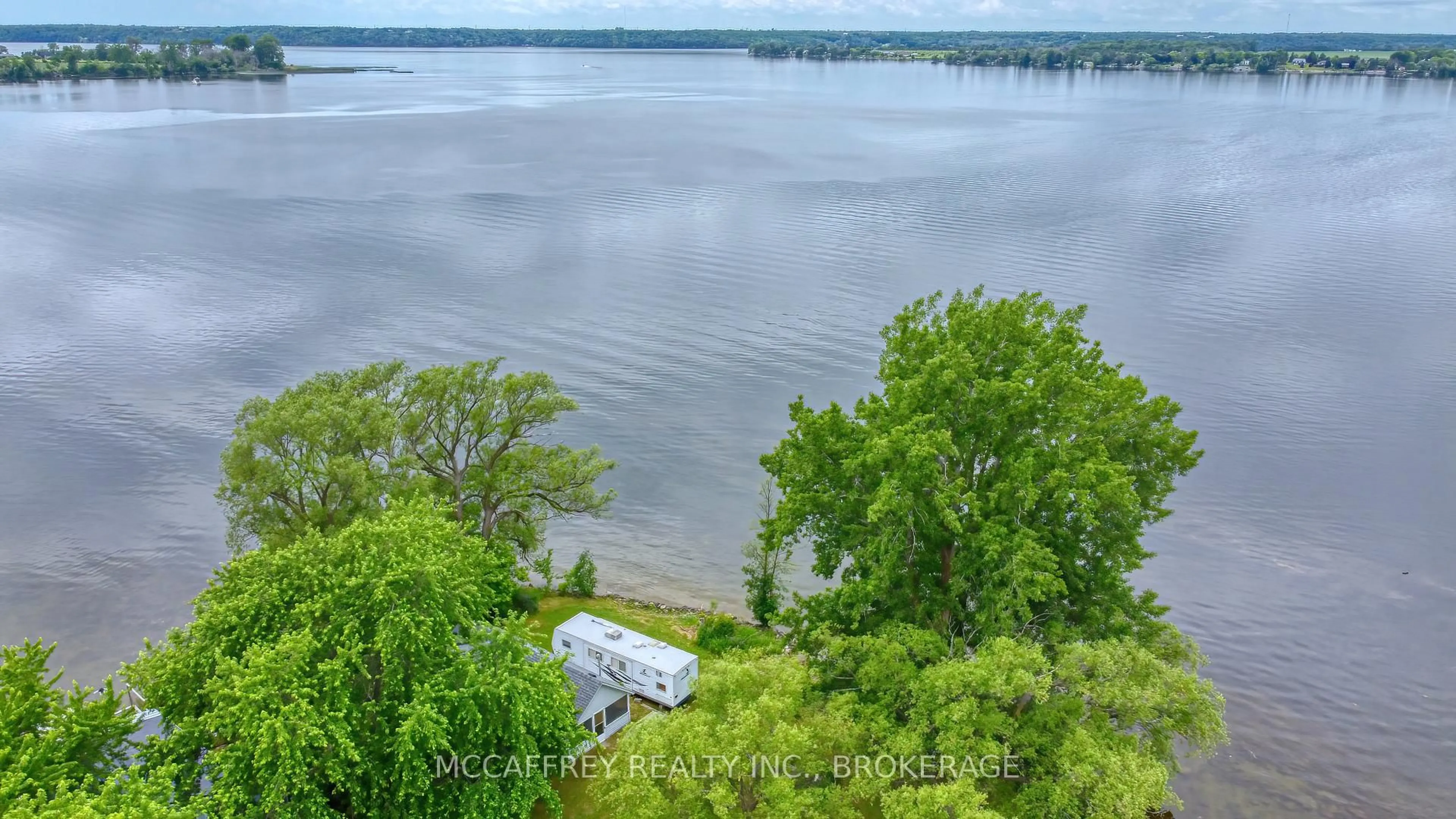 A pic from outside/outdoor area/front of a property/back of a property/a pic from drone, water/lake/river/ocean view for 94 WILLOW POINT Lane, Napanee Ontario K7R 3K7