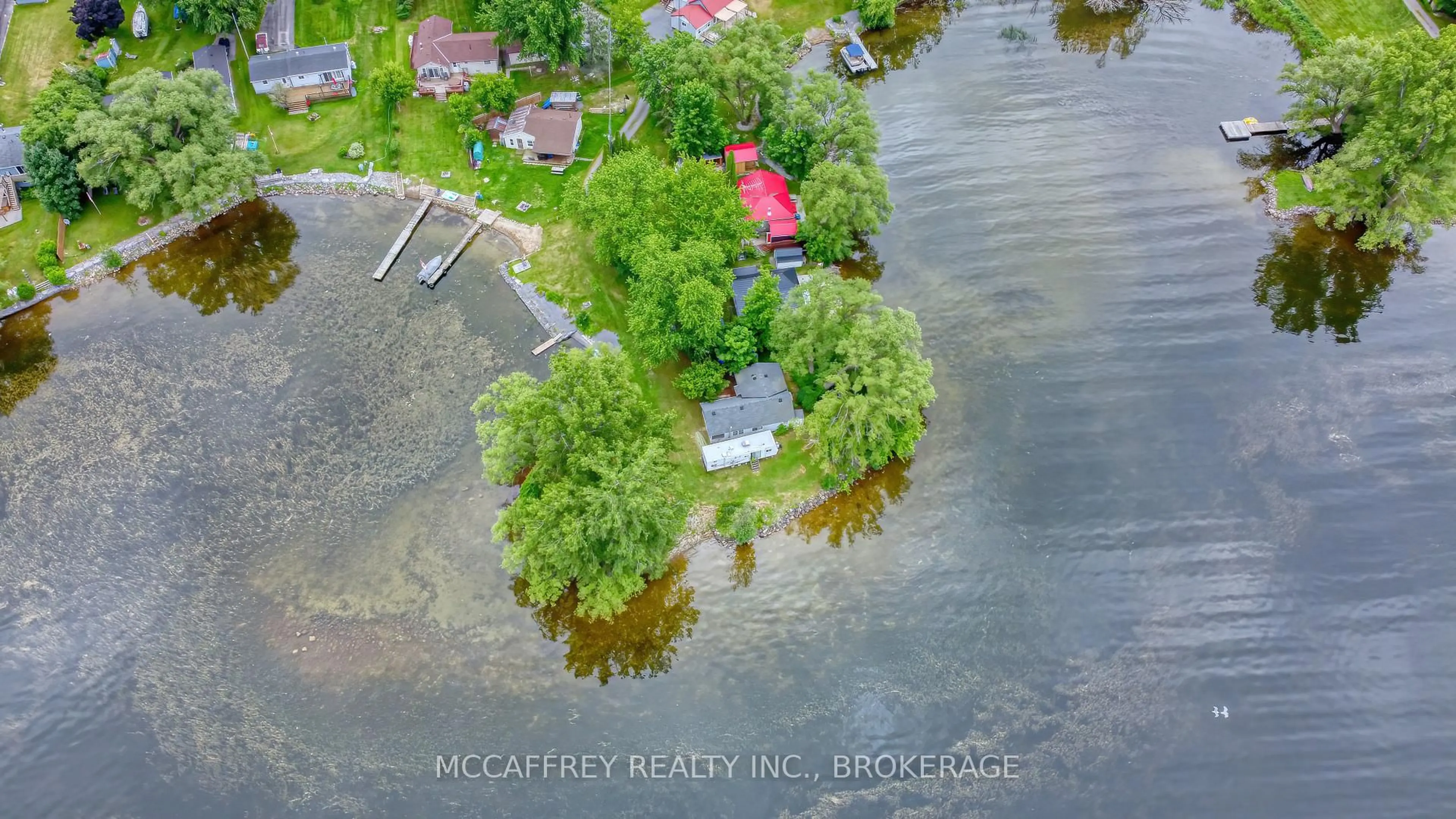 A pic from outside/outdoor area/front of a property/back of a property/a pic from drone, water/lake/river/ocean view for 94 WILLOW POINT Lane, Napanee Ontario K7R 3K7