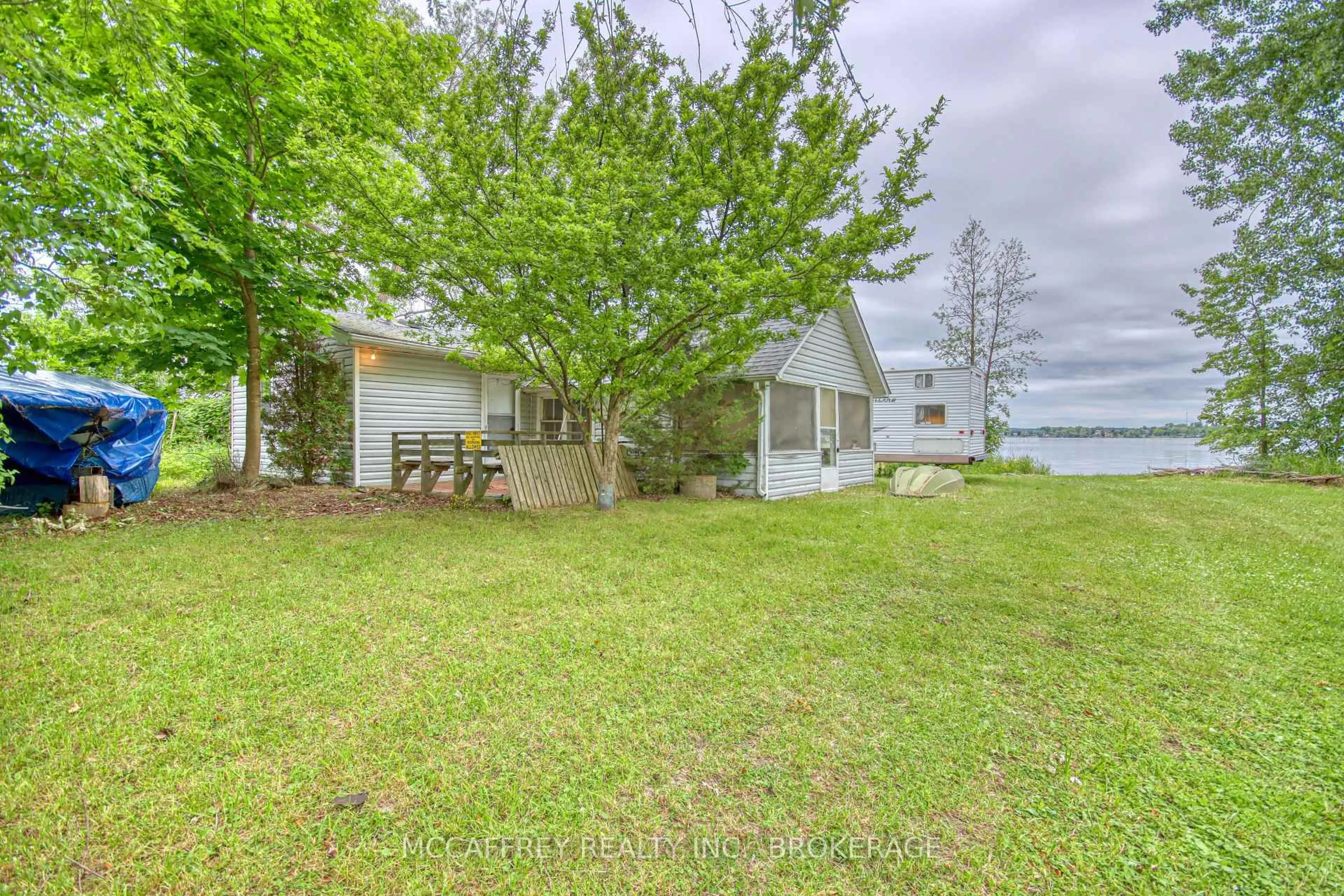 A pic from outside/outdoor area/front of a property/back of a property/a pic from drone, water/lake/river/ocean view for 94 WILLOW POINT Lane, Napanee Ontario K7R 3K7