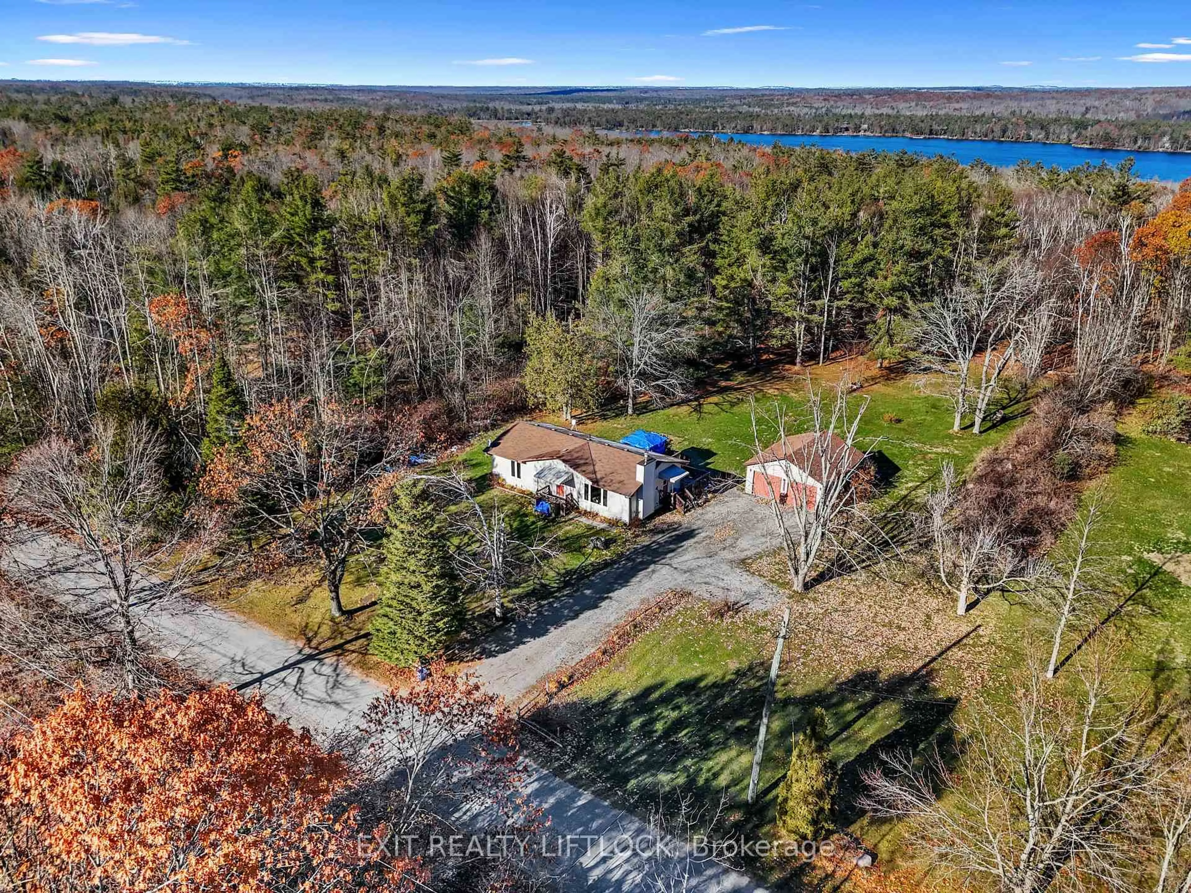 A pic from outside/outdoor area/front of a property/back of a property/a pic from drone, water/lake/river/ocean view for 2348 18th Line, Selwyn Ontario K0L 2H0