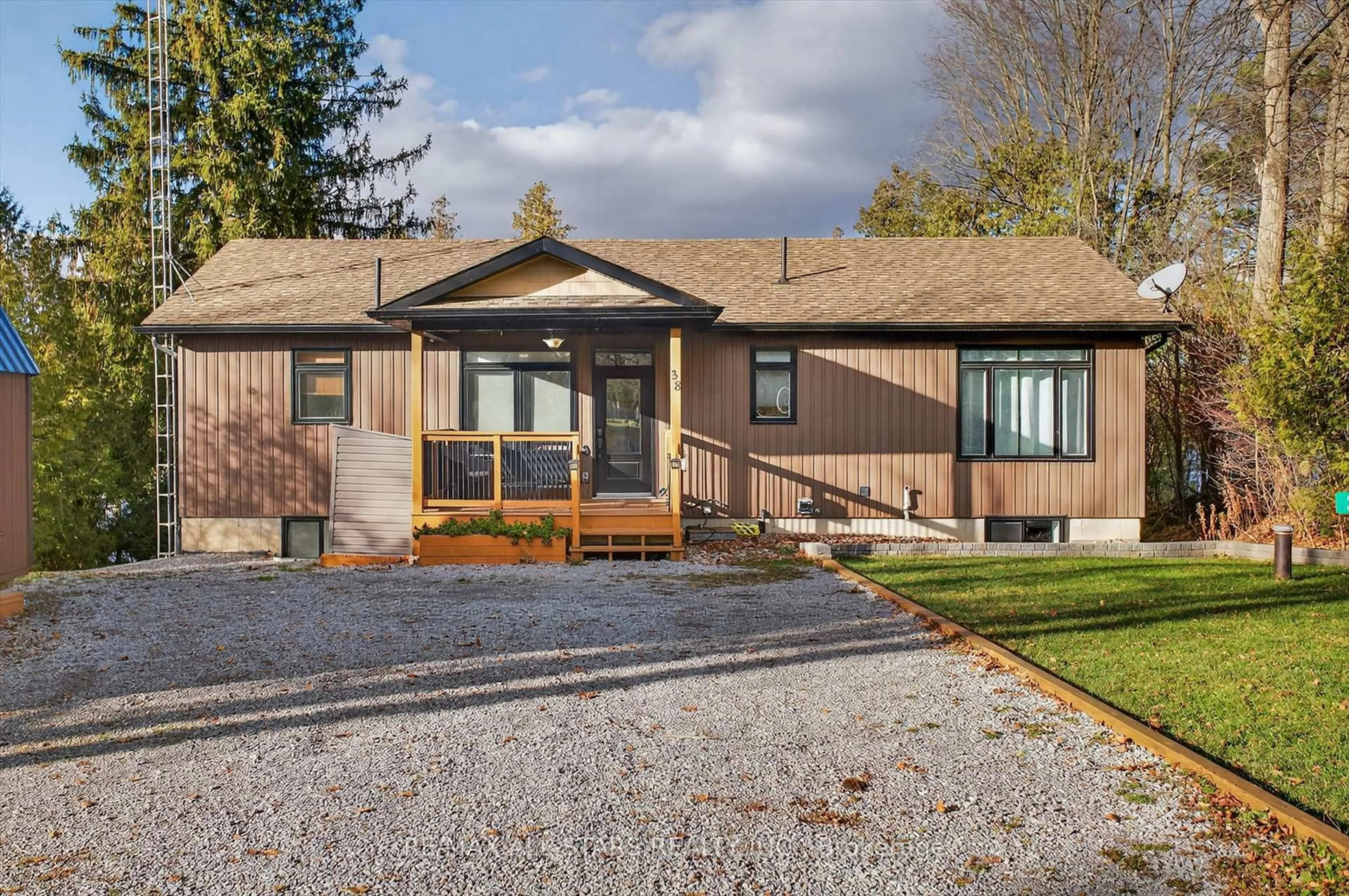 Home with vinyl exterior material, street for 38 Pheasant St, Kawartha Lakes Ontario K0L 2W0