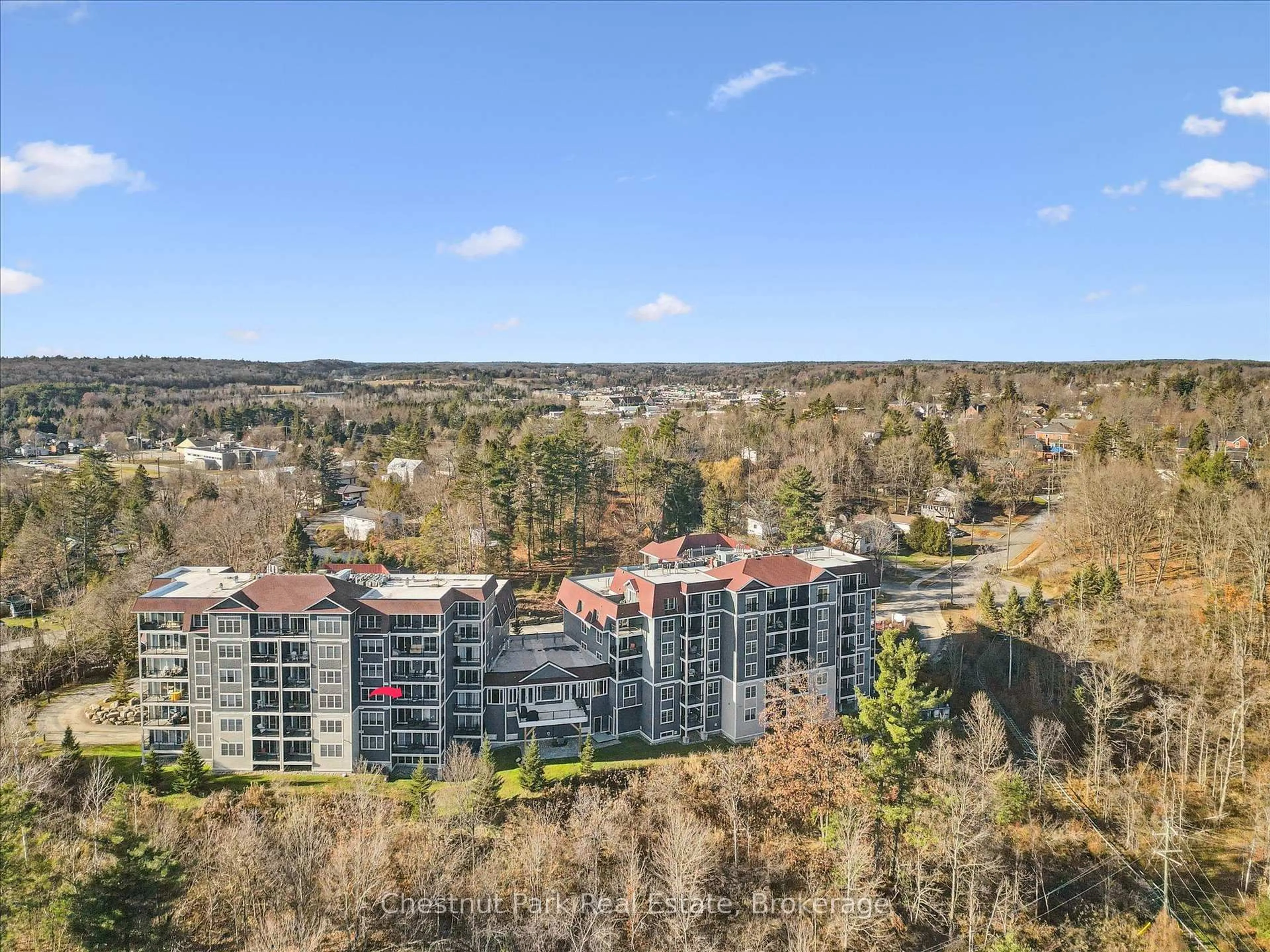 A pic from outside/outdoor area/front of a property/back of a property/a pic from drone, unknown for 10B Kimberley Ave #209, Bracebridge Ontario P1L 0A6