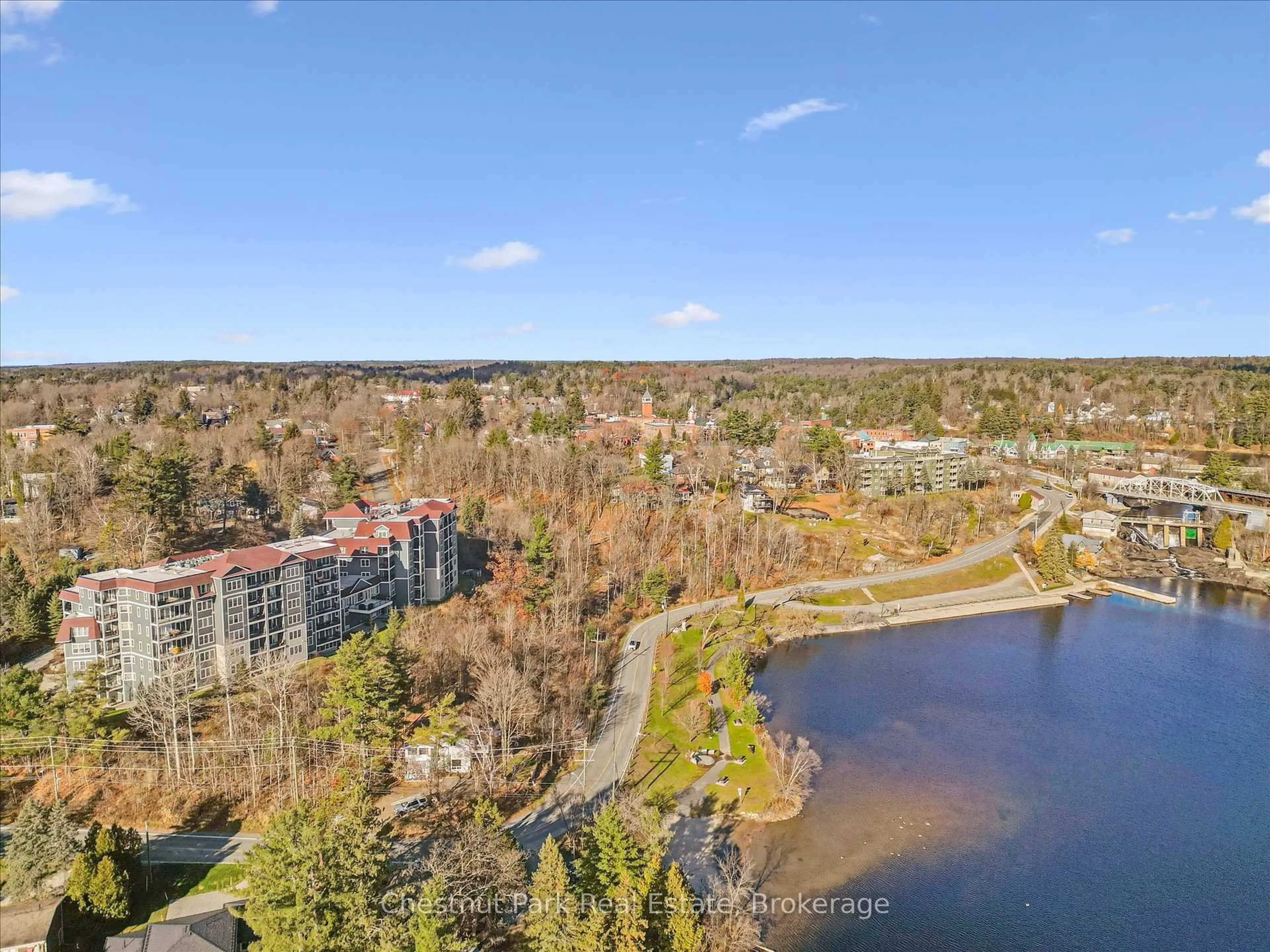 A pic from outside/outdoor area/front of a property/back of a property/a pic from drone, water/lake/river/ocean view for 10B Kimberley Ave #209, Bracebridge Ontario P1L 0A6