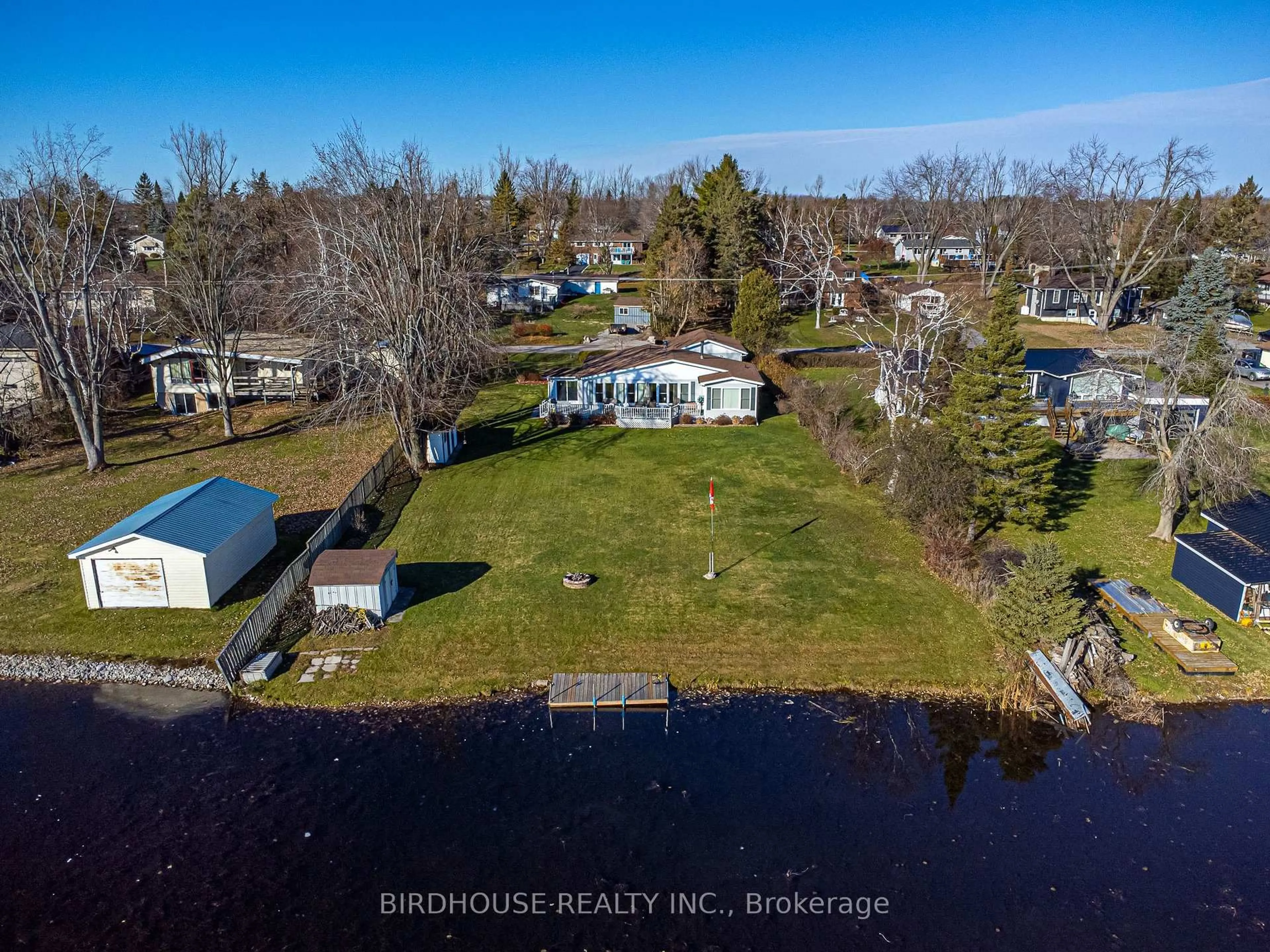 A pic from outside/outdoor area/front of a property/back of a property/a pic from drone, water/lake/river/ocean view for 132 Fenelon Dr, Kawartha Lakes Ontario K0M 1G0
