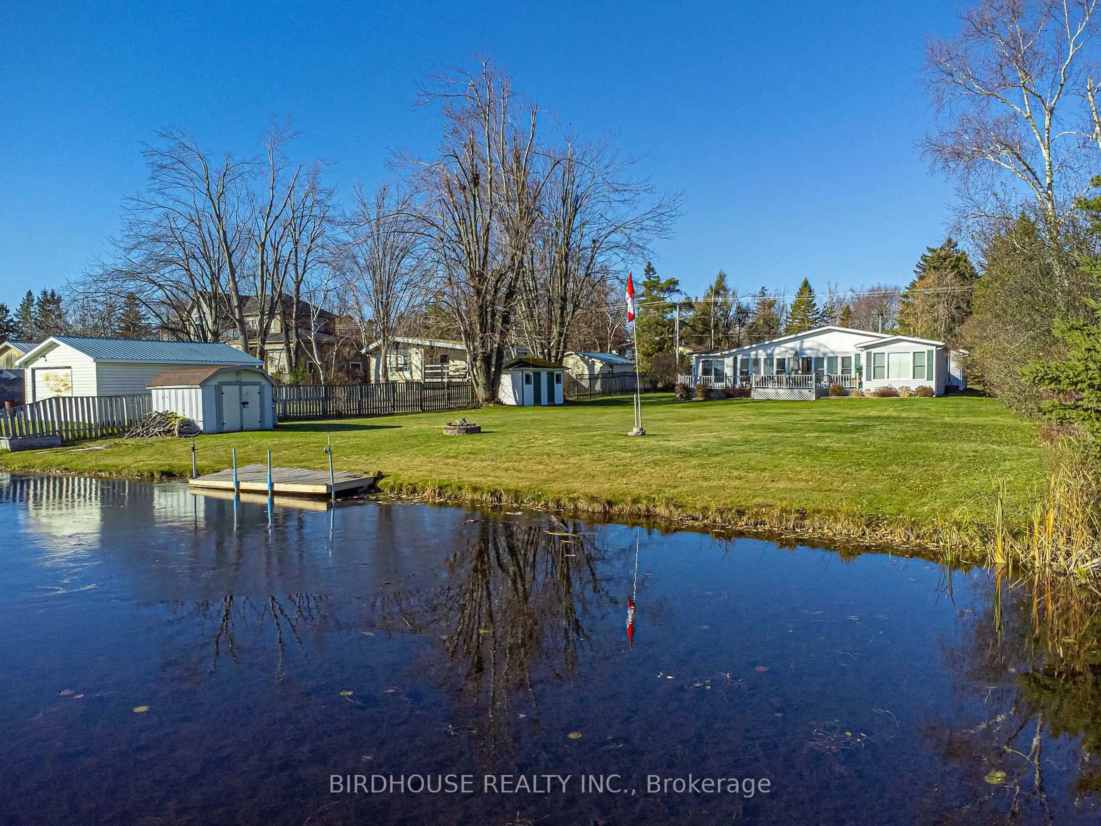 A pic from outside/outdoor area/front of a property/back of a property/a pic from drone, water/lake/river/ocean view for 132 Fenelon Dr, Kawartha Lakes Ontario K0M 1G0