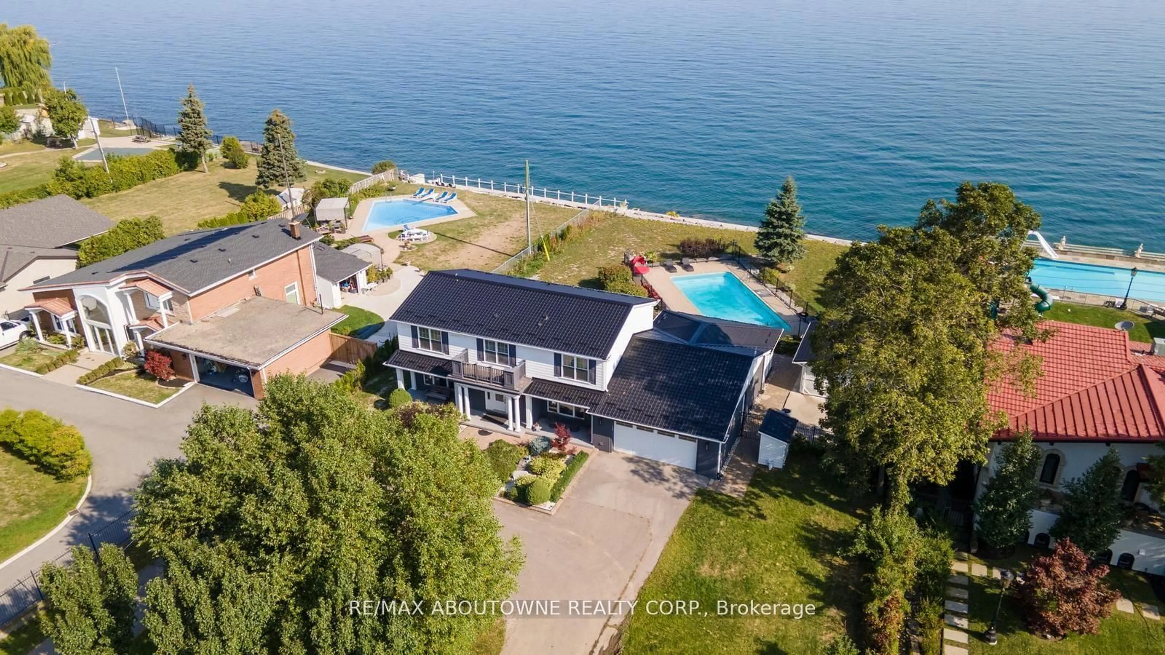 A pic from outside/outdoor area/front of a property/back of a property/a pic from drone, water/lake/river/ocean view for 1073 North Service Rd, Hamilton Ontario L8E 5E1