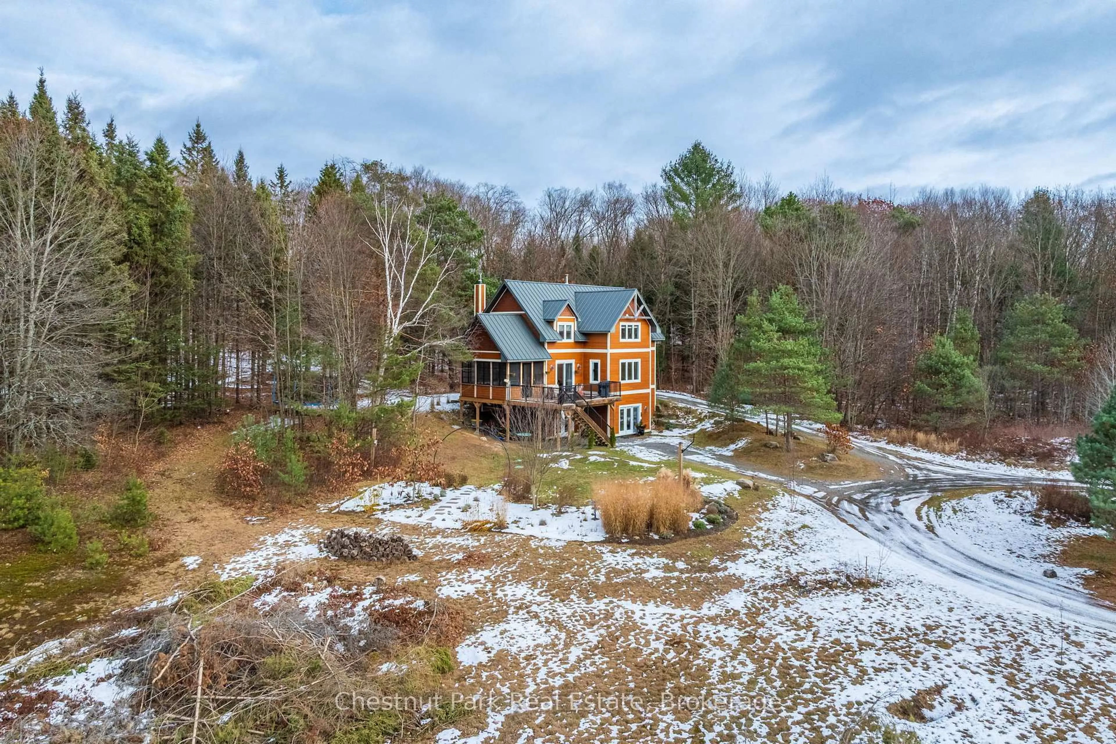 A pic from outside/outdoor area/front of a property/back of a property/a pic from drone, water/lake/river/ocean view for 1555 Etwell Rd, Huntsville Ontario P1H 2J2