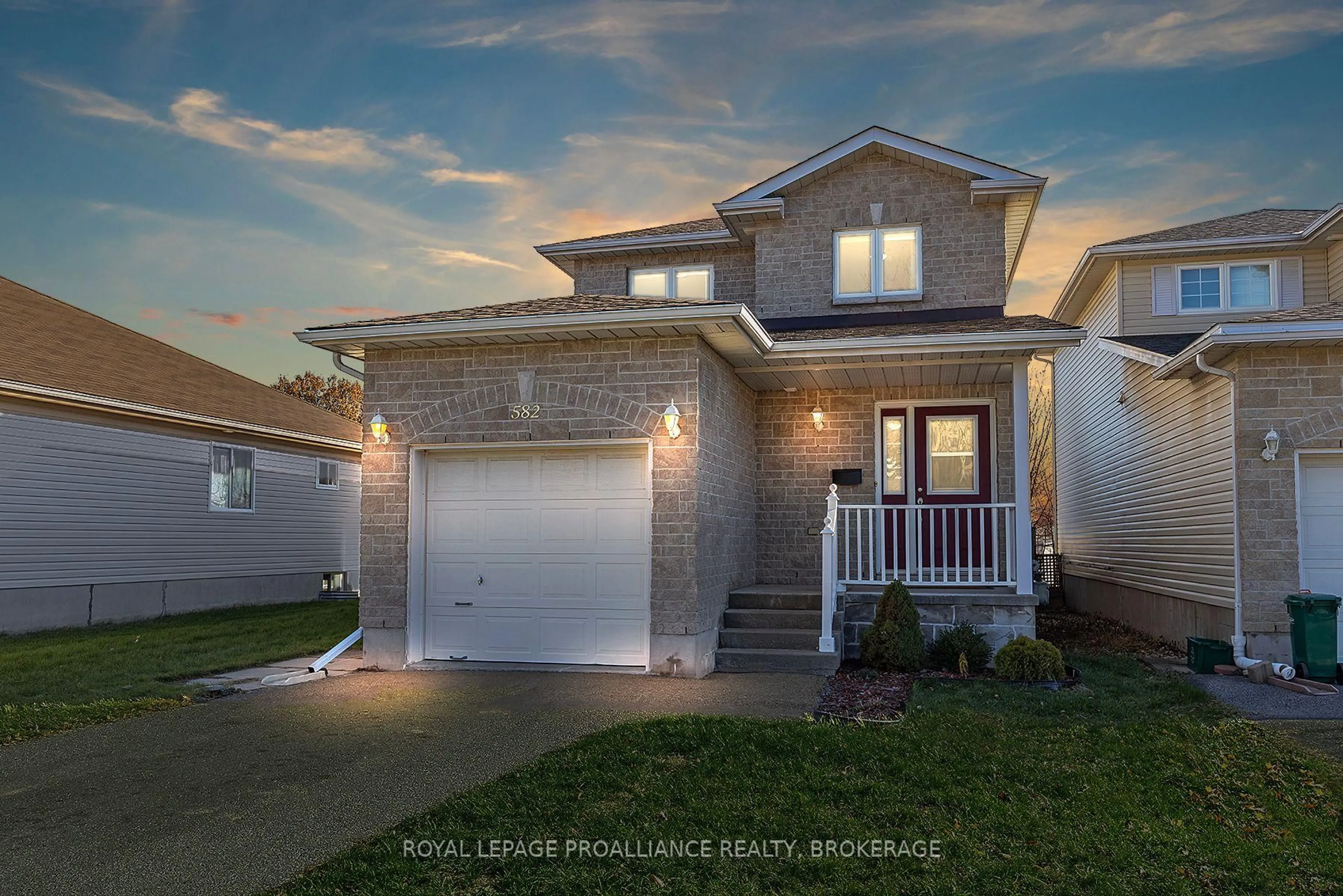 Home with brick exterior material, street for 582 Heritage Crt, Kingston Ontario K7M 9C9