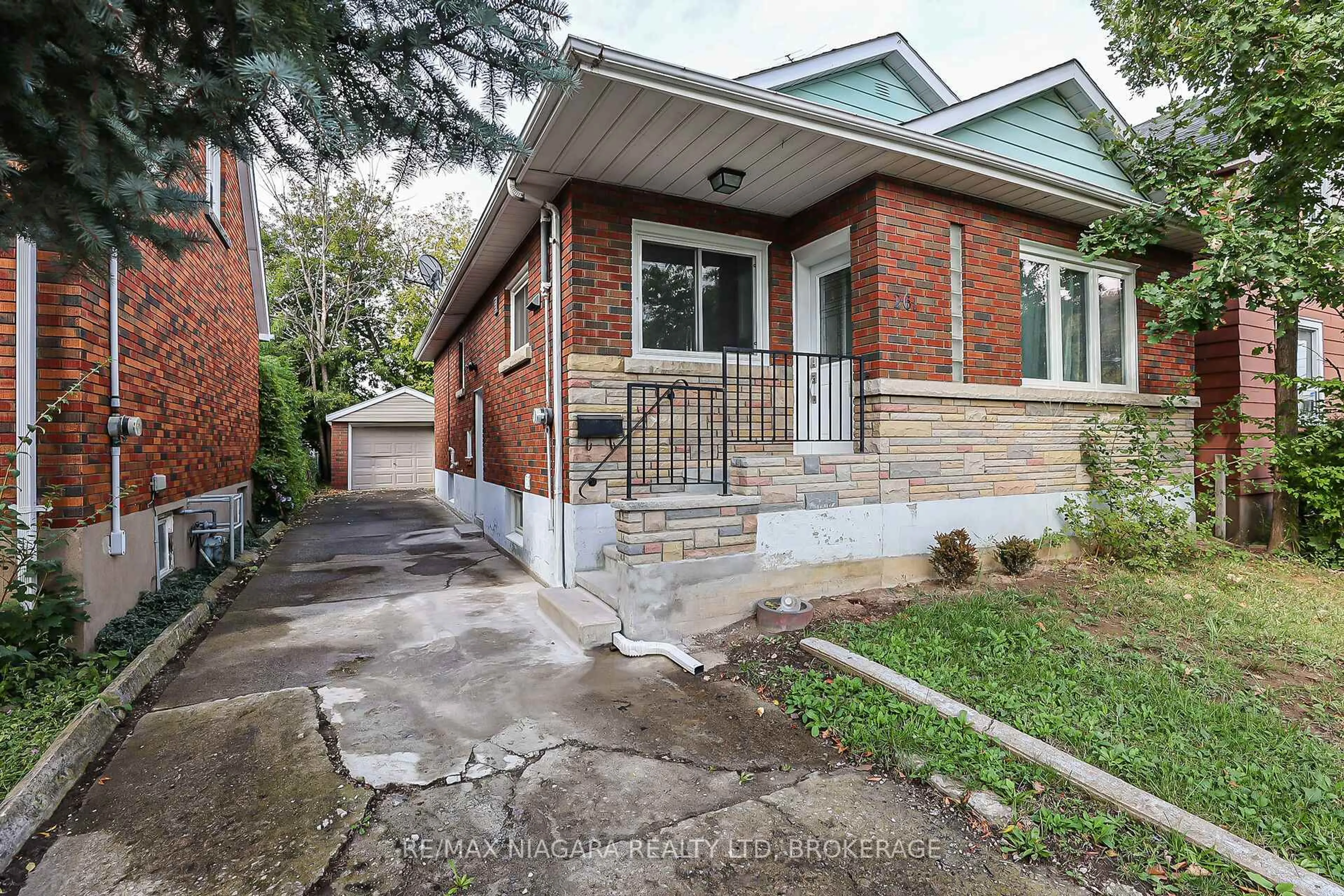 Home with brick exterior material, street for 261 Vine St, St. Catharines Ontario L2M 4T2