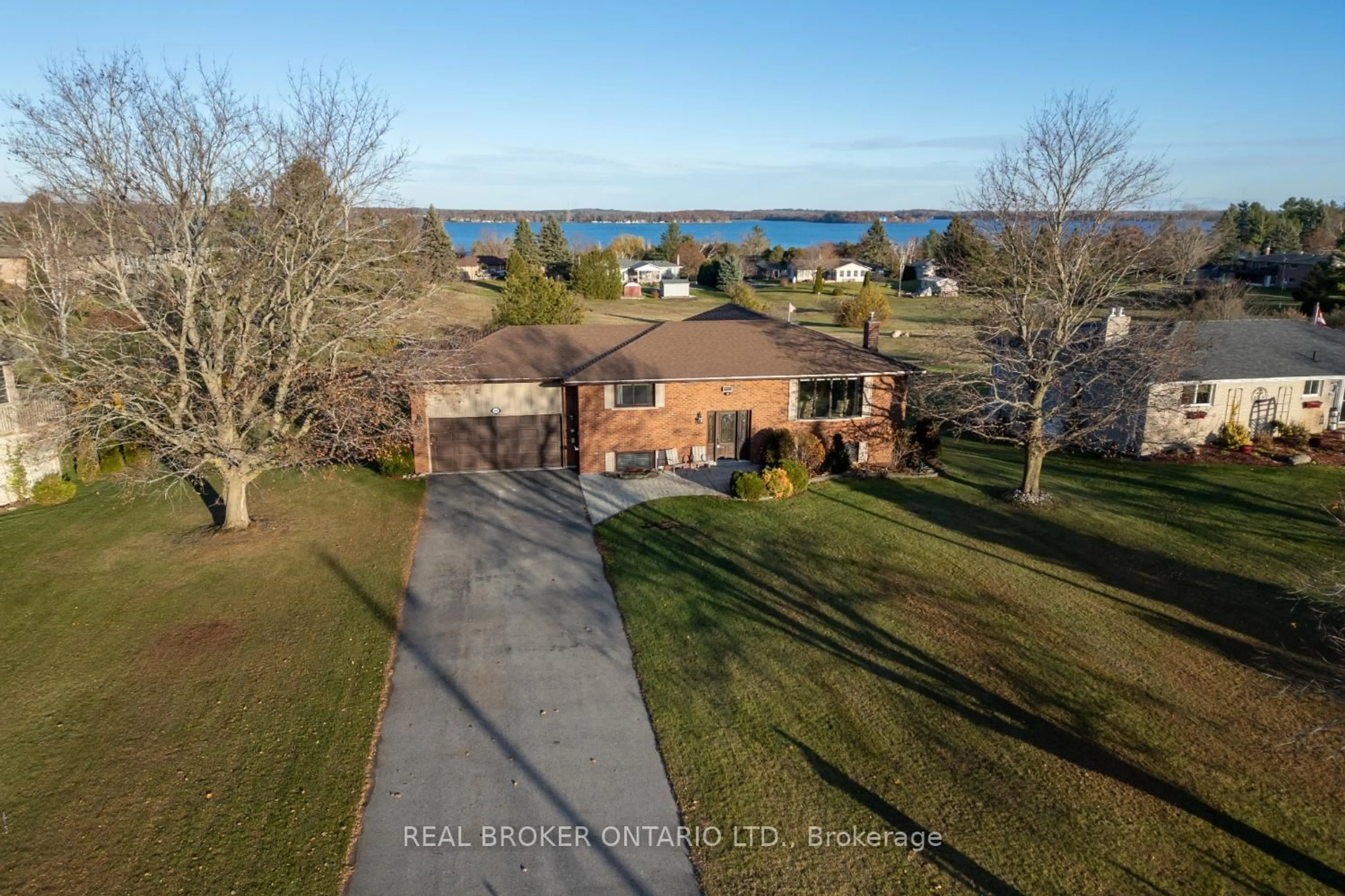 A pic from outside/outdoor area/front of a property/back of a property/a pic from drone, water/lake/river/ocean view for 307 The Captain's Corner, Kawartha Lakes Ontario K0M 1A0
