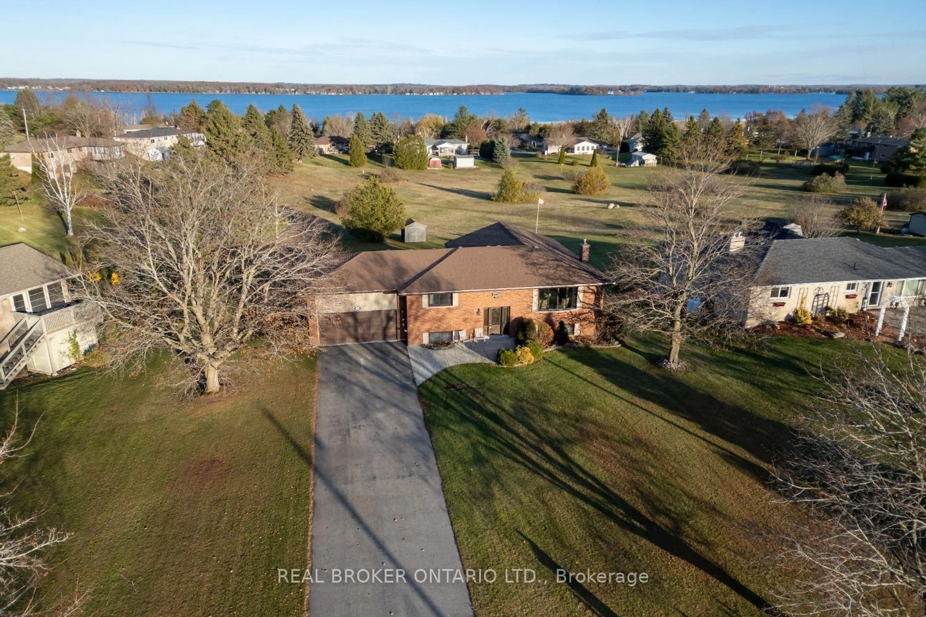 A pic from outside/outdoor area/front of a property/back of a property/a pic from drone, water/lake/river/ocean view for 307 The Captain's Corner, Kawartha Lakes Ontario K0M 1A0