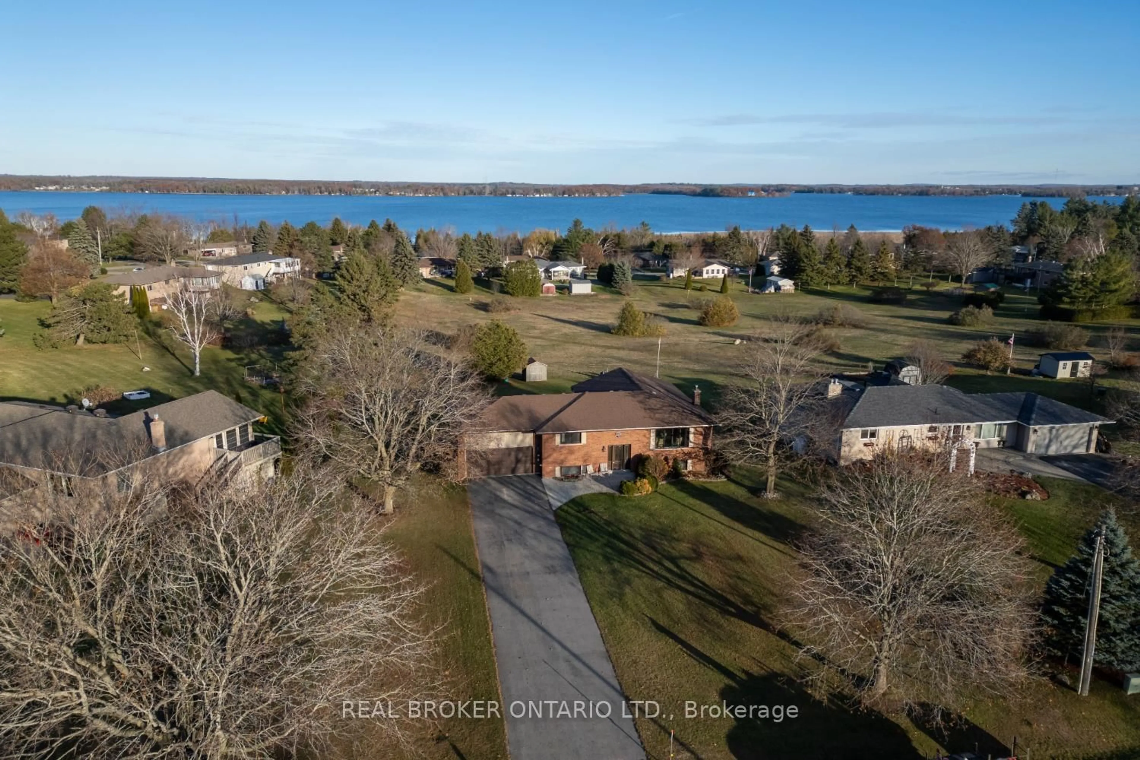 A pic from outside/outdoor area/front of a property/back of a property/a pic from drone, water/lake/river/ocean view for 307 The Captain's Corner, Kawartha Lakes Ontario K0M 1A0