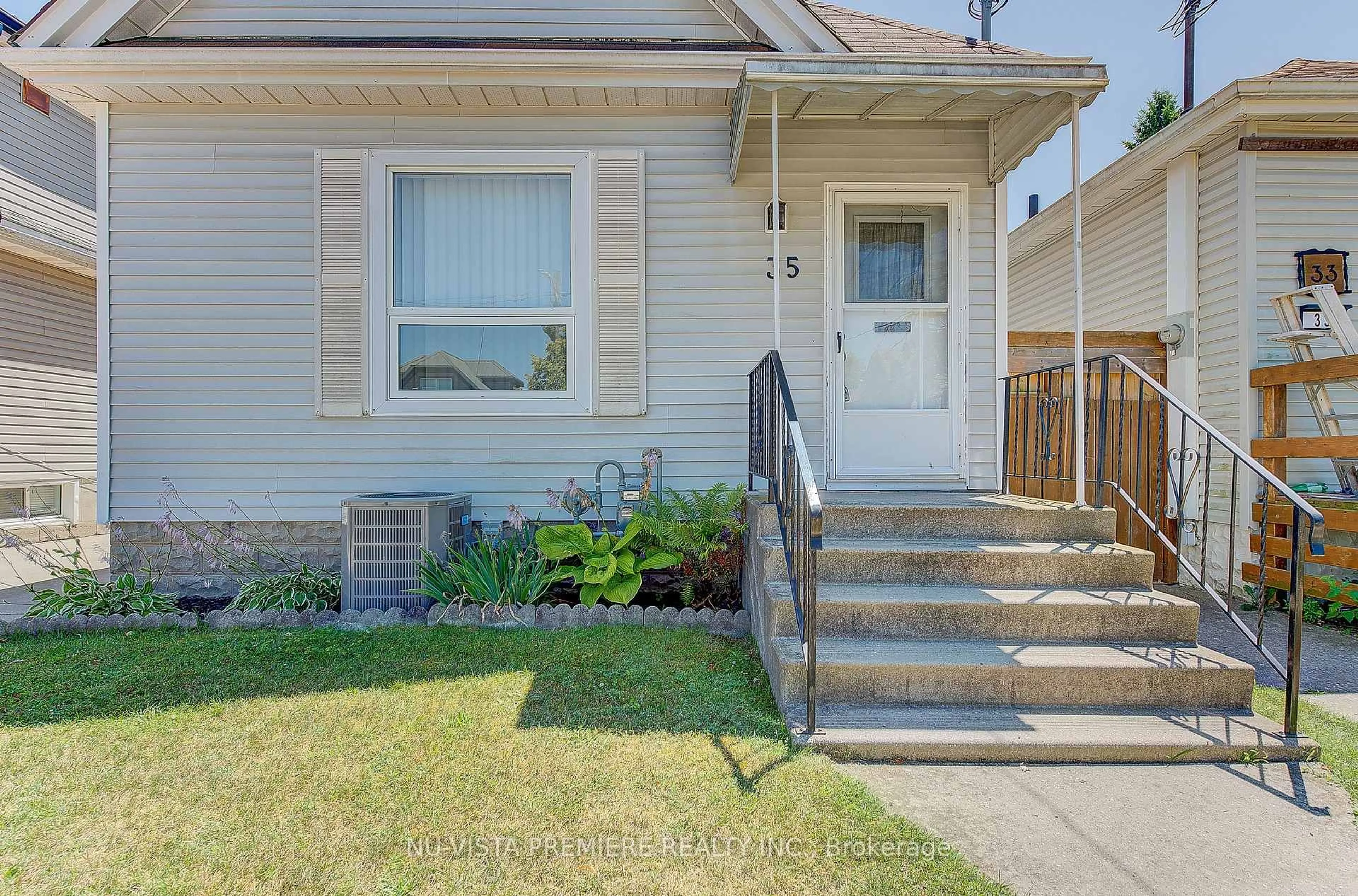 Home with vinyl exterior material, street for 35 Major St, London East Ontario N5Z 1E2