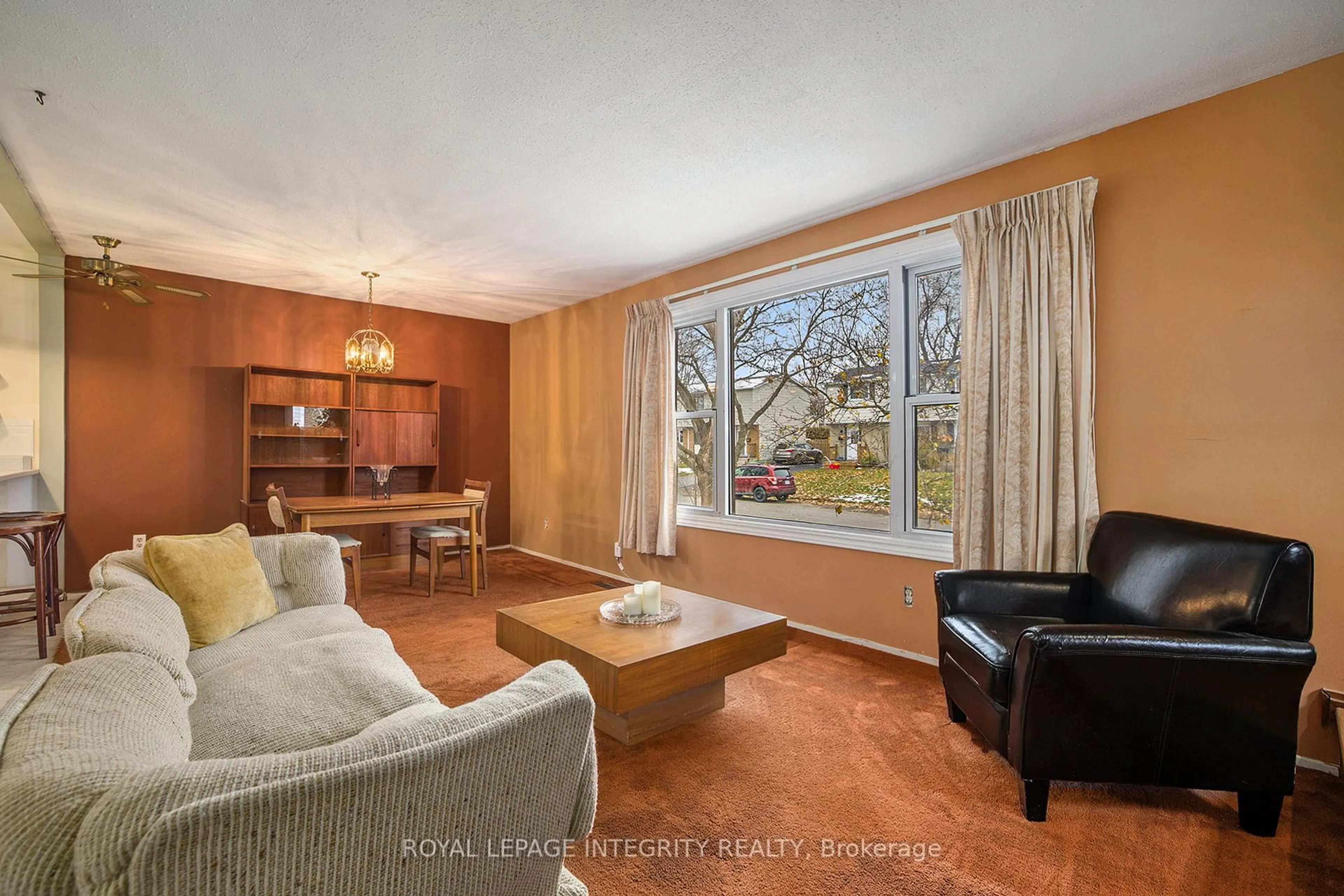 Living room with furniture, wood/laminate floor for 9 Shouldice Cres, Ottawa Ontario K2L 1M8