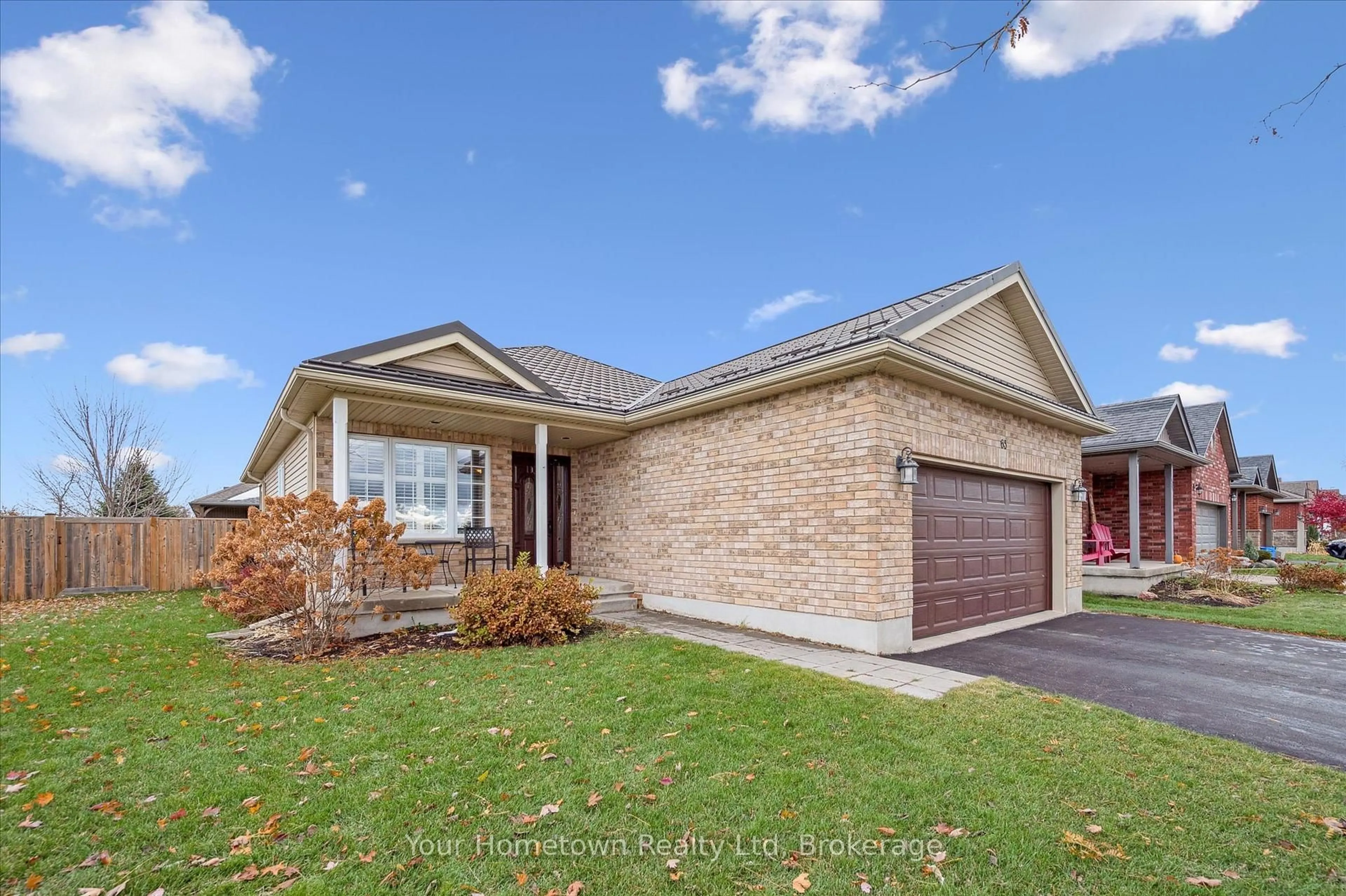Home with brick exterior material, street for 63 Spencer Dr, Centre Wellington Ontario N0B 1S0
