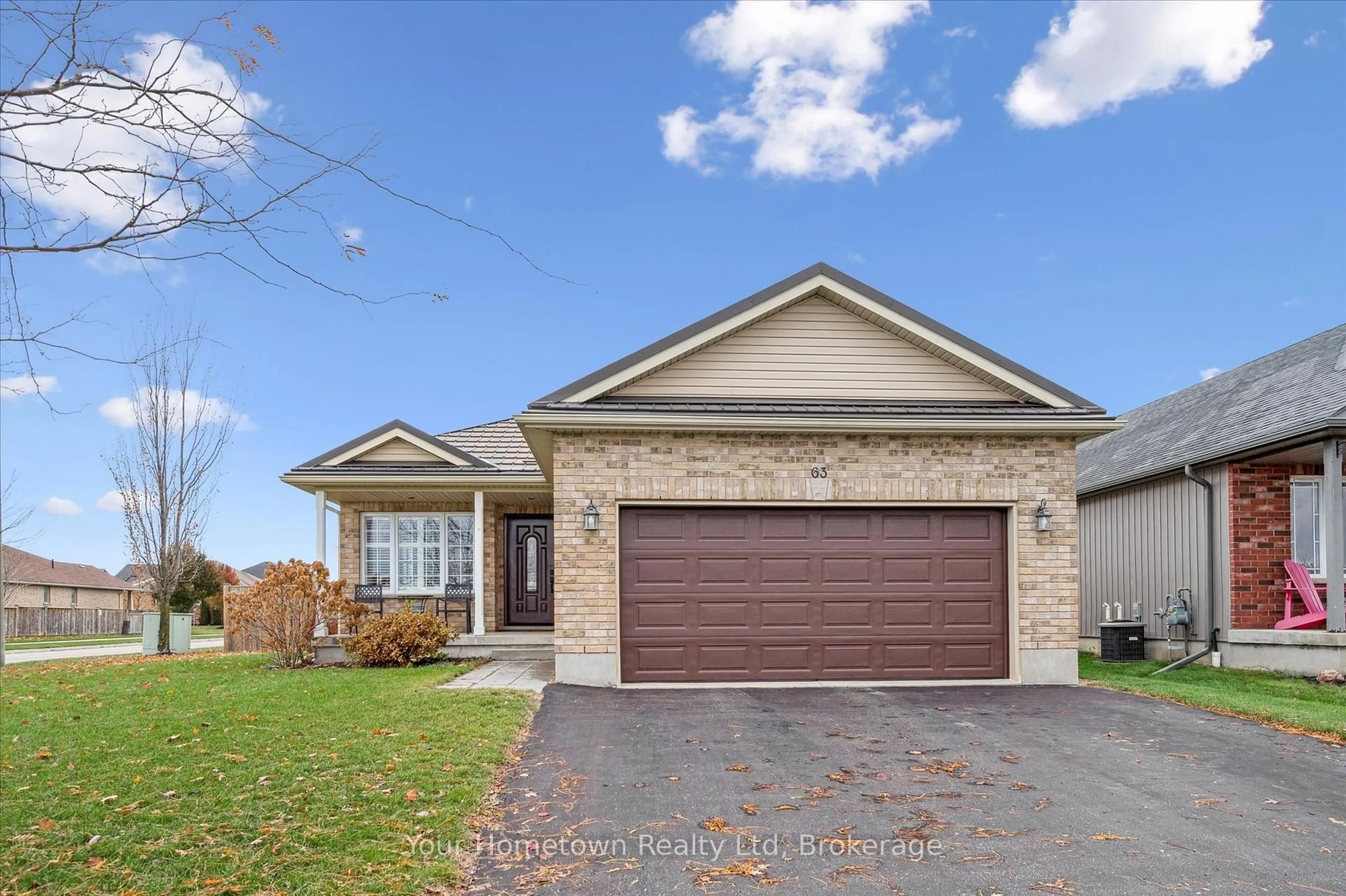 Home with brick exterior material, street for 63 Spencer Dr, Centre Wellington Ontario N0B 1S0