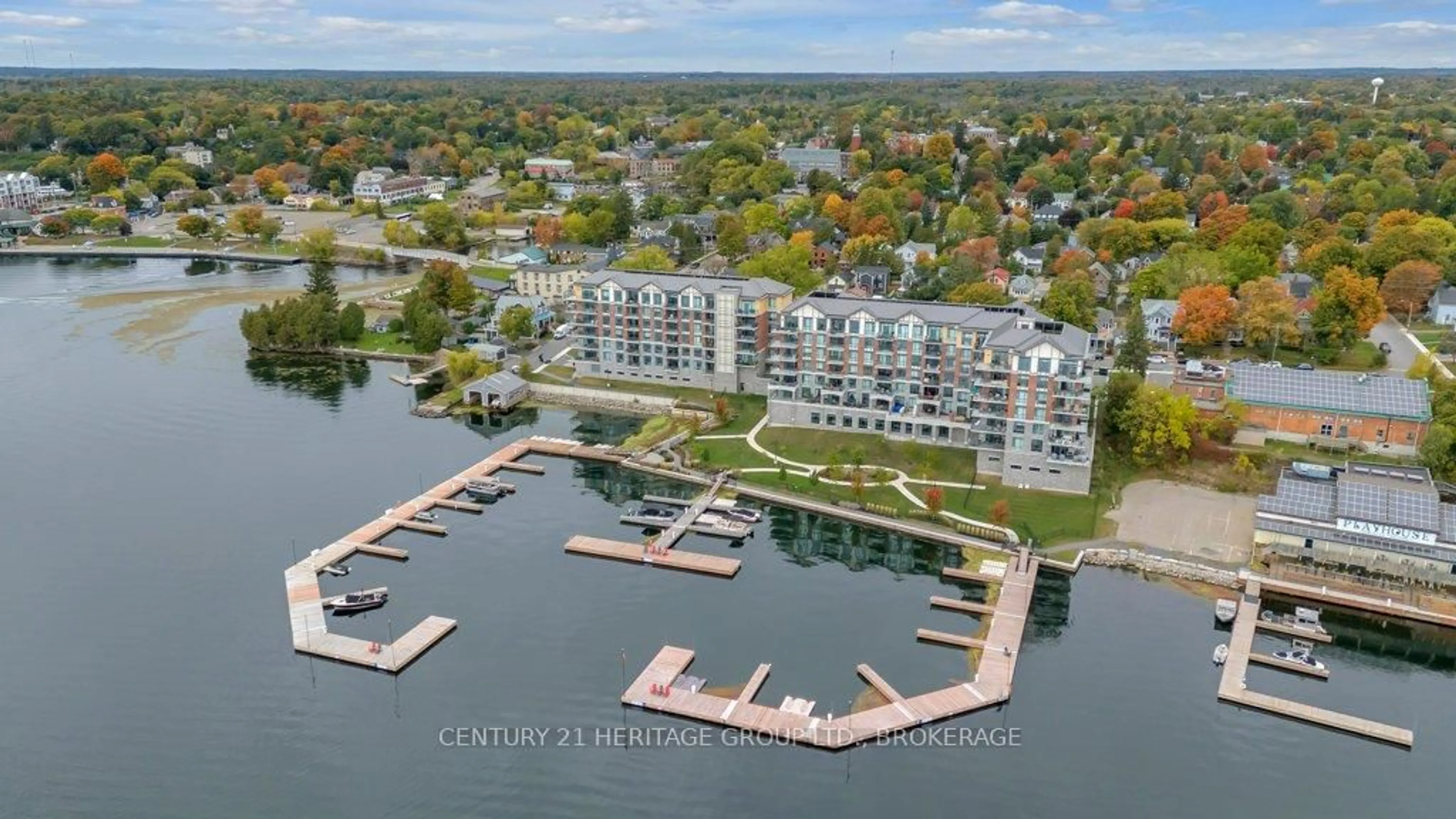 A pic from outside/outdoor area/front of a property/back of a property/a pic from drone, water/lake/river/ocean view for 129 South St #306, Gananoque Ontario K7G 1A1