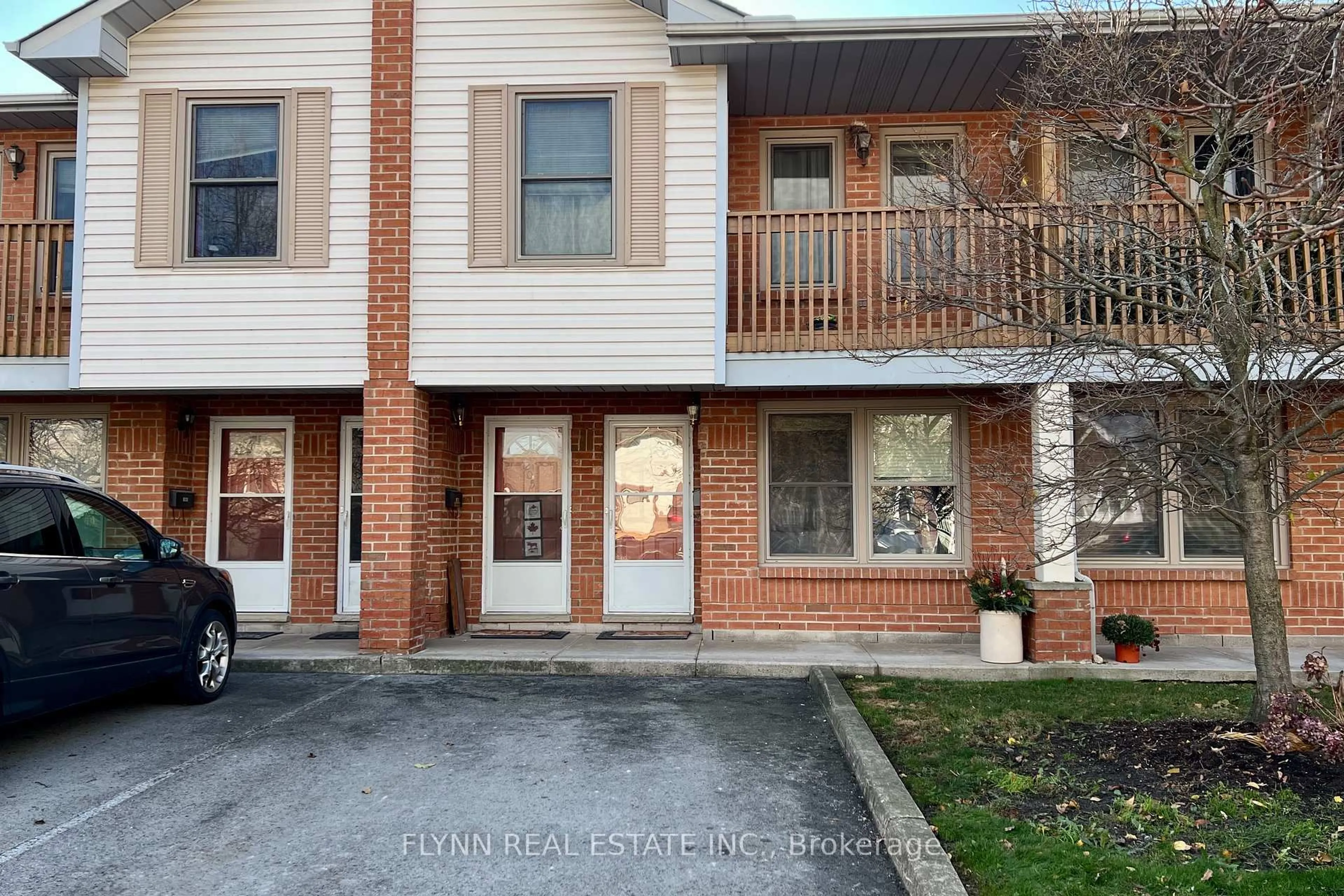 A pic from outside/outdoor area/front of a property/back of a property/a pic from drone, street for 2 Walnut St #105, St. Catharines Ontario L2T 1H3