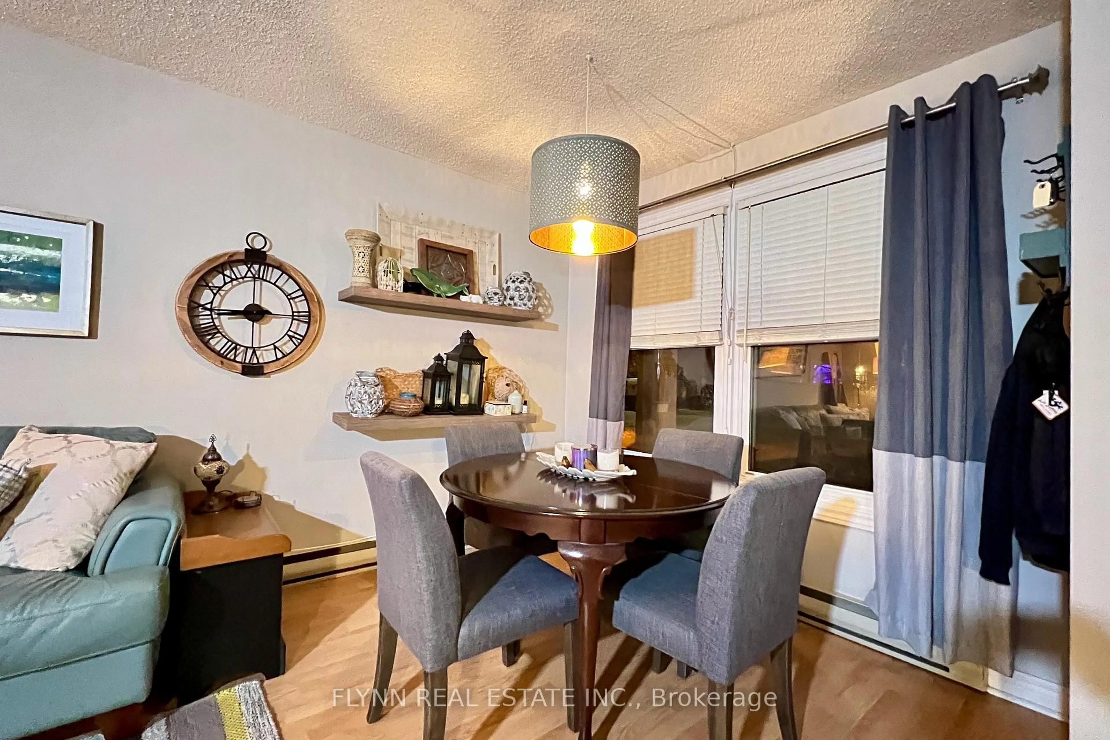 Dining room, wood/laminate floor for 2 Walnut St #105, St. Catharines Ontario L2T 1H3