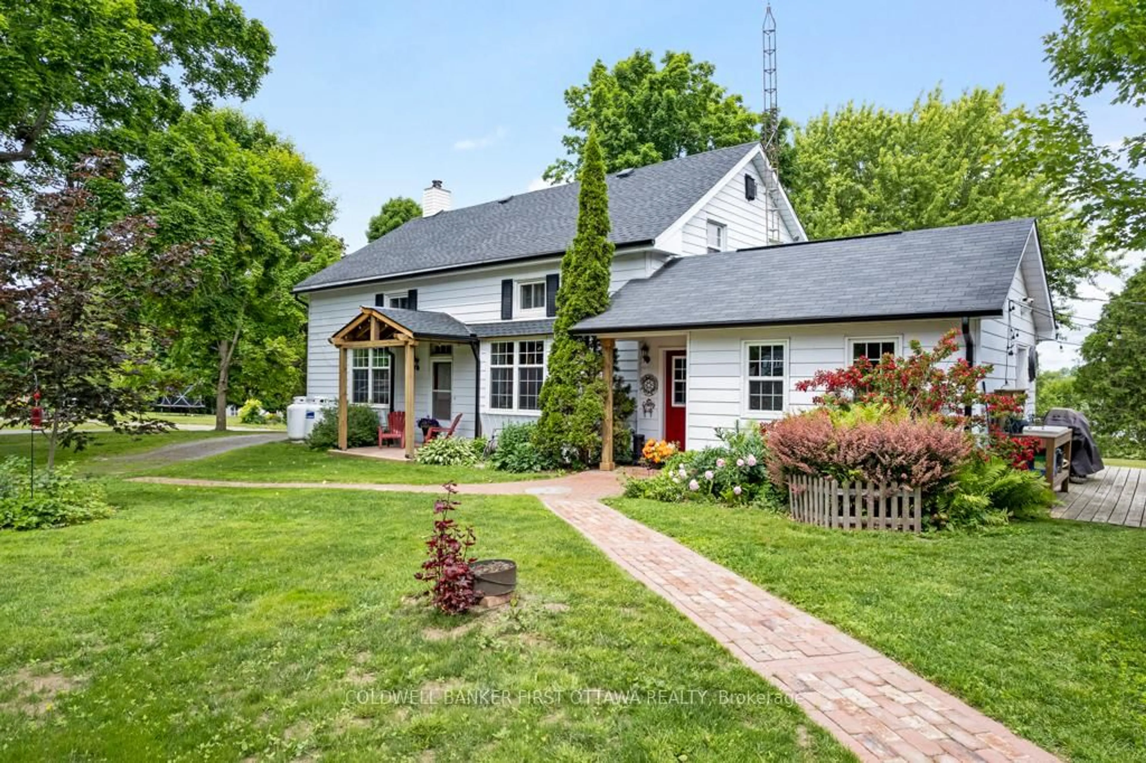 Home with brick exterior material, street for 4 Station Rd, Rideau Lakes Ontario K0G 1V0