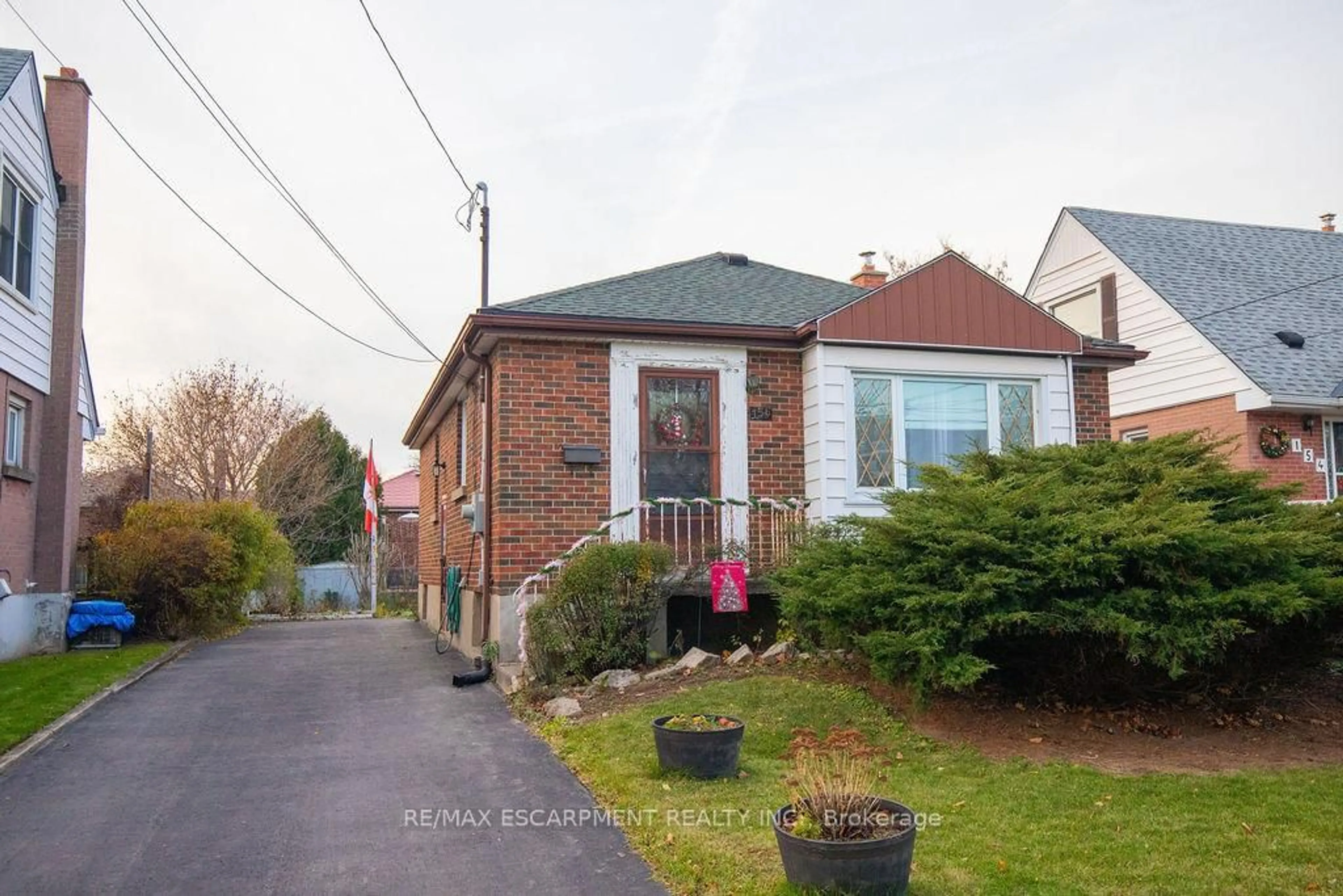 Home with brick exterior material, street for 156 East 36th St, Hamilton Ontario L8W 1C8