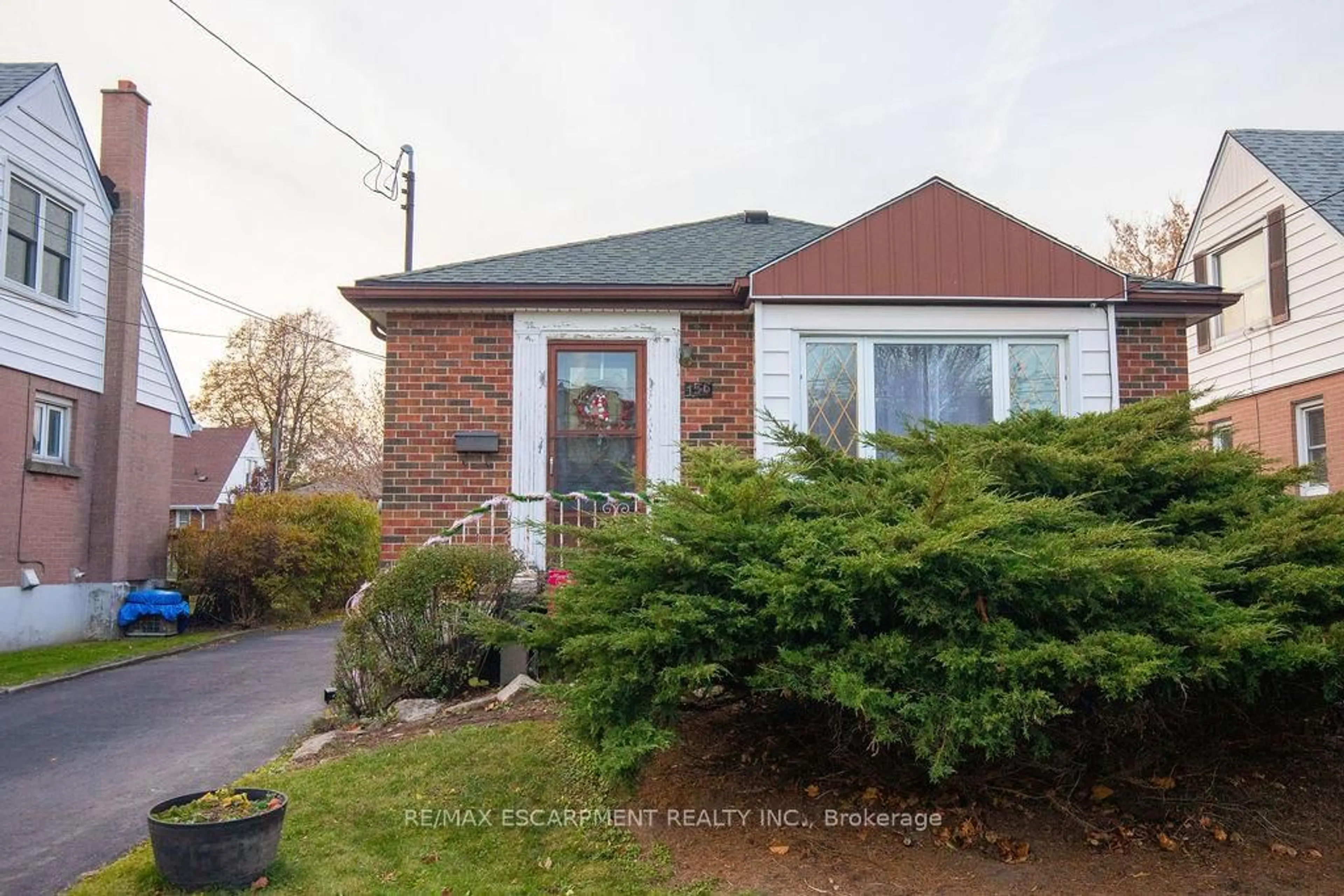 Home with brick exterior material, street for 156 East 36th St, Hamilton Ontario L8W 1C8