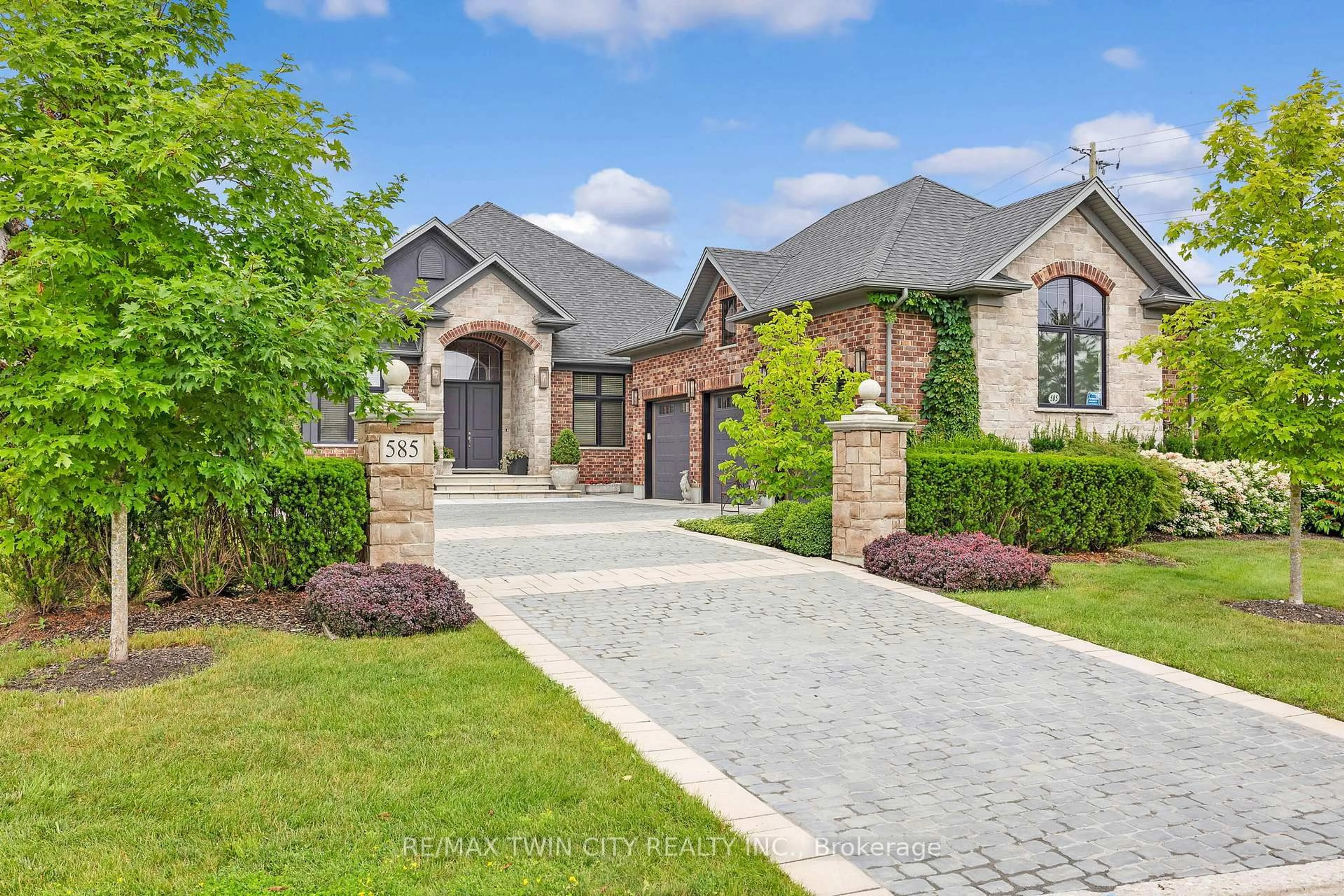 Home with brick exterior material, street for 585 Regal Pl, Waterloo Ontario N2V 2G3