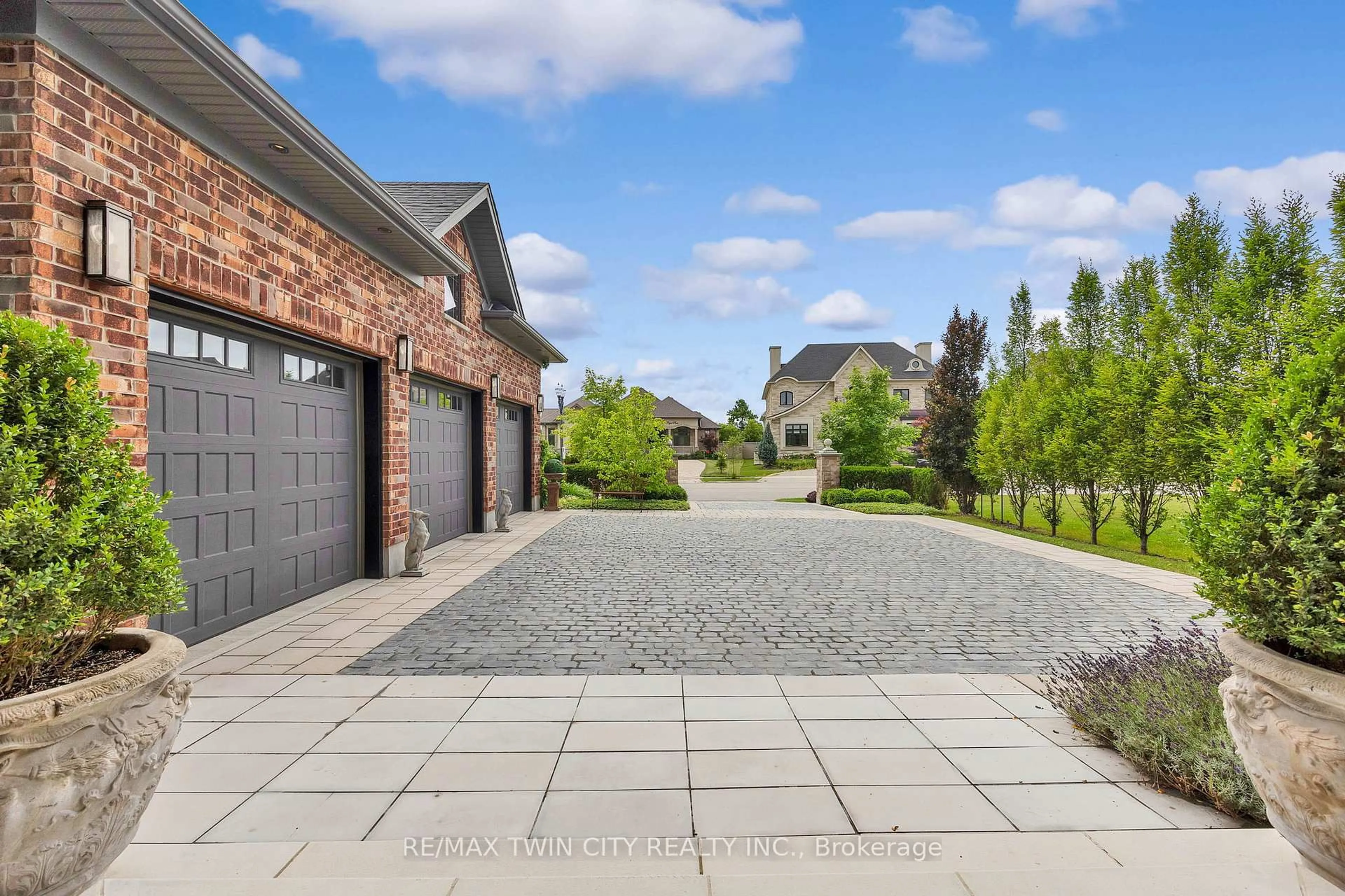 Home with brick exterior material, street for 585 Regal Pl, Waterloo Ontario N2V 2G3