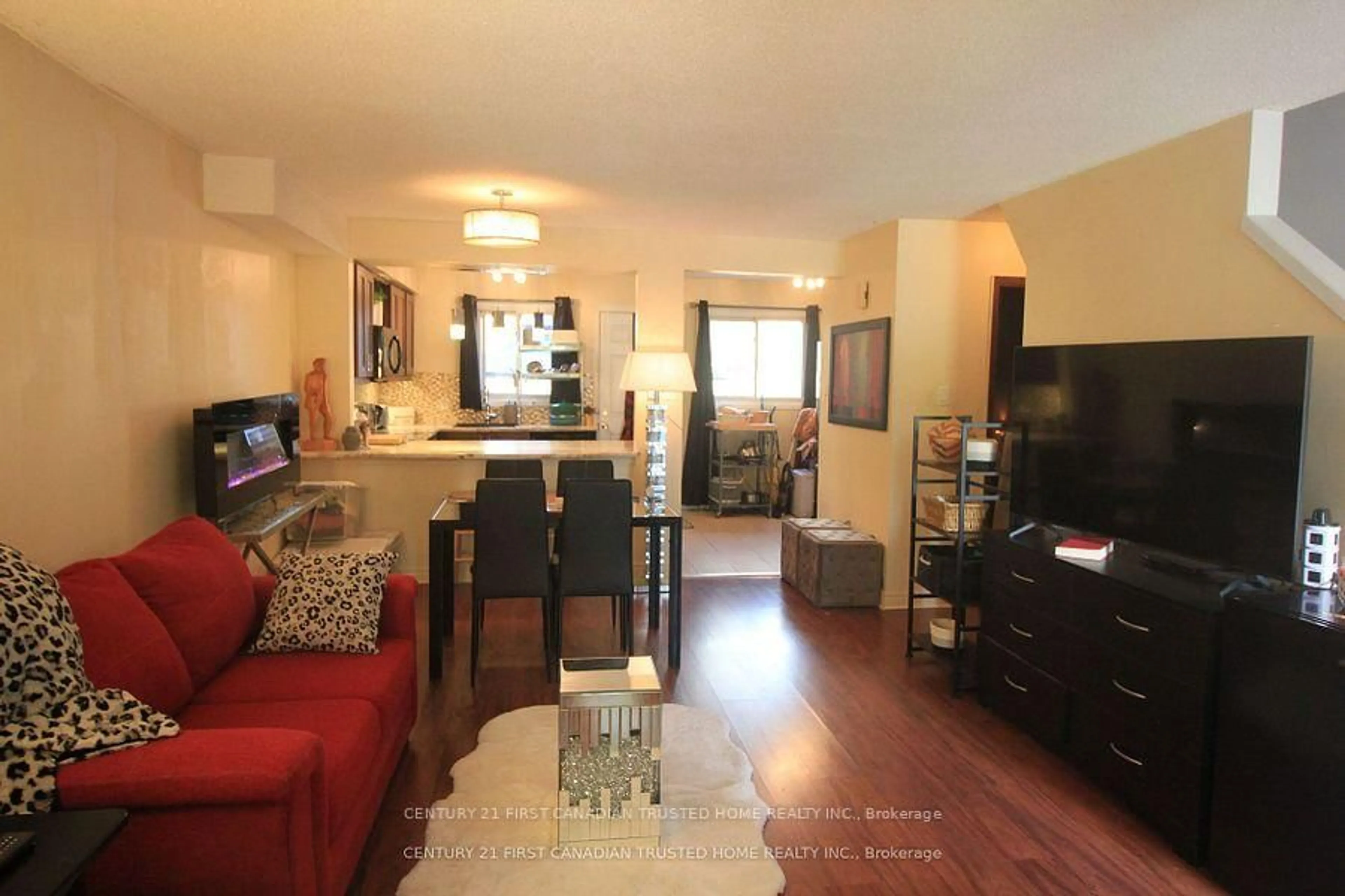 Living room with furniture, wood/laminate floor for 1430 Jalna Blvd #27, London South Ontario N6E 3C1