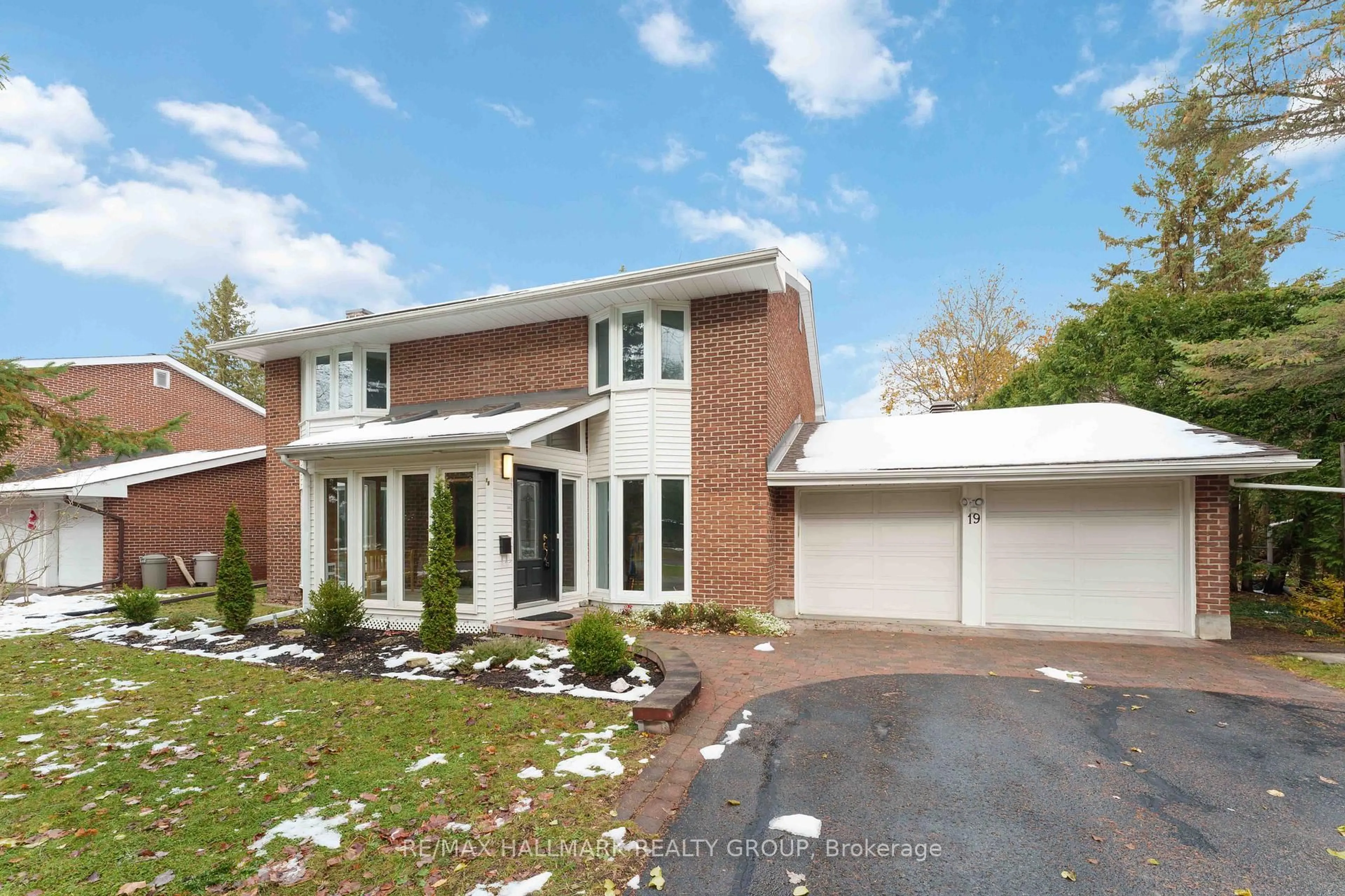 Home with brick exterior material, street for 19 Kingsford Cres, Ottawa Ontario K2K 1T5