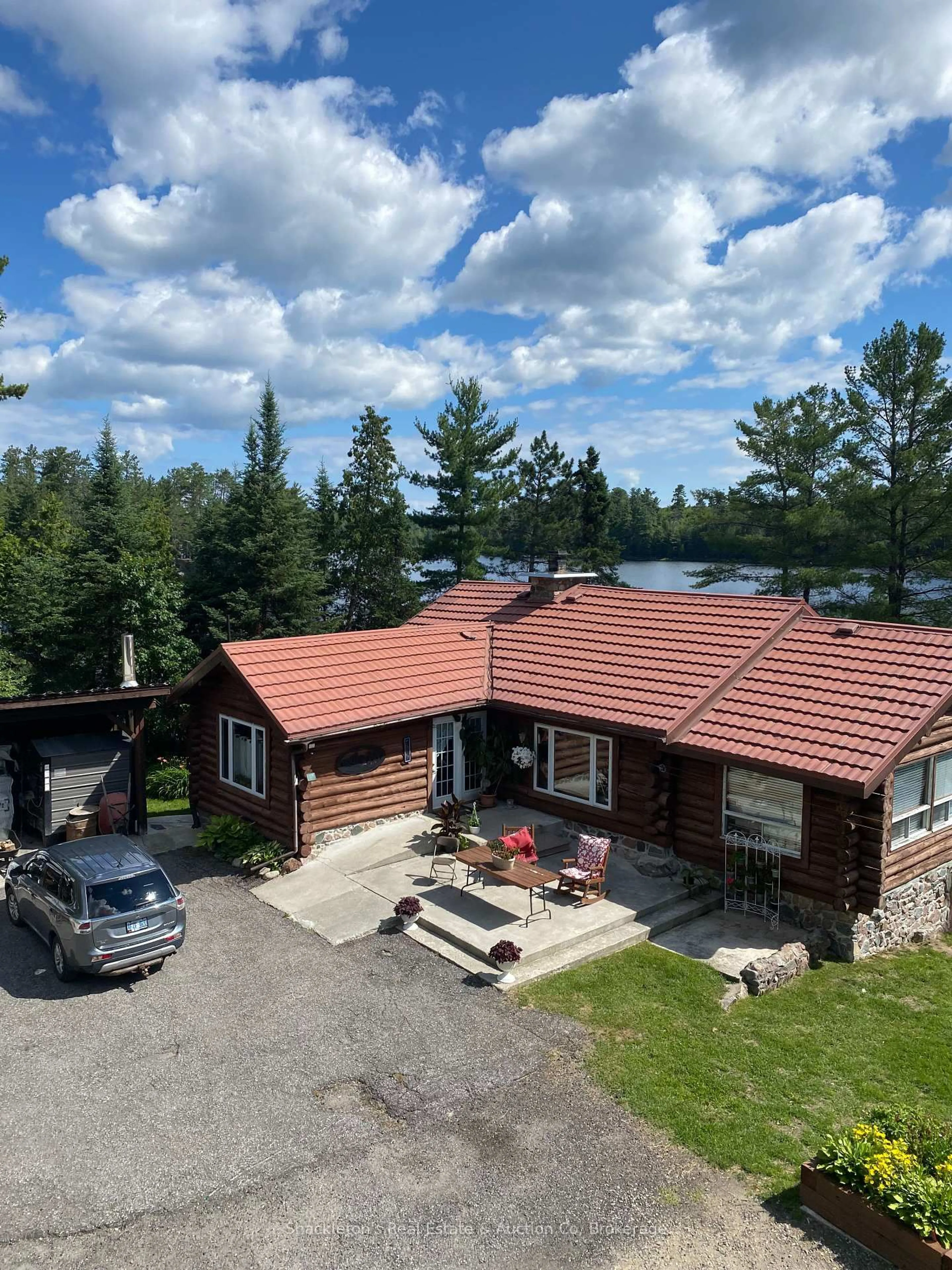 A pic from outside/outdoor area/front of a property/back of a property/a pic from drone, unknown for 2407 Highway 11 Highway, Unorganized Townships Ontario P0H 1T0