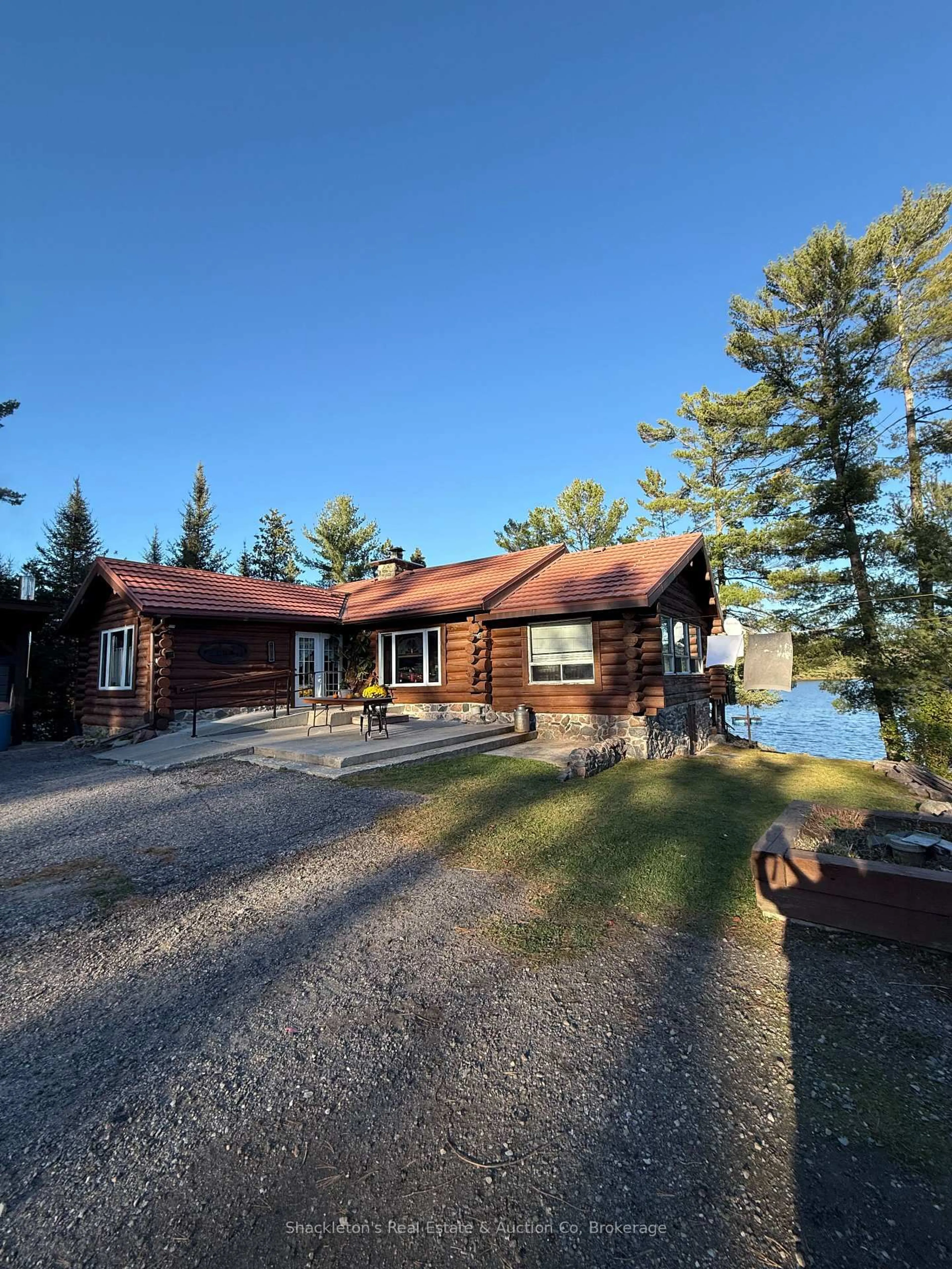 A pic from outside/outdoor area/front of a property/back of a property/a pic from drone, water/lake/river/ocean view for 2407 Highway 11 Highway, Unorganized Townships Ontario P0H 1T0