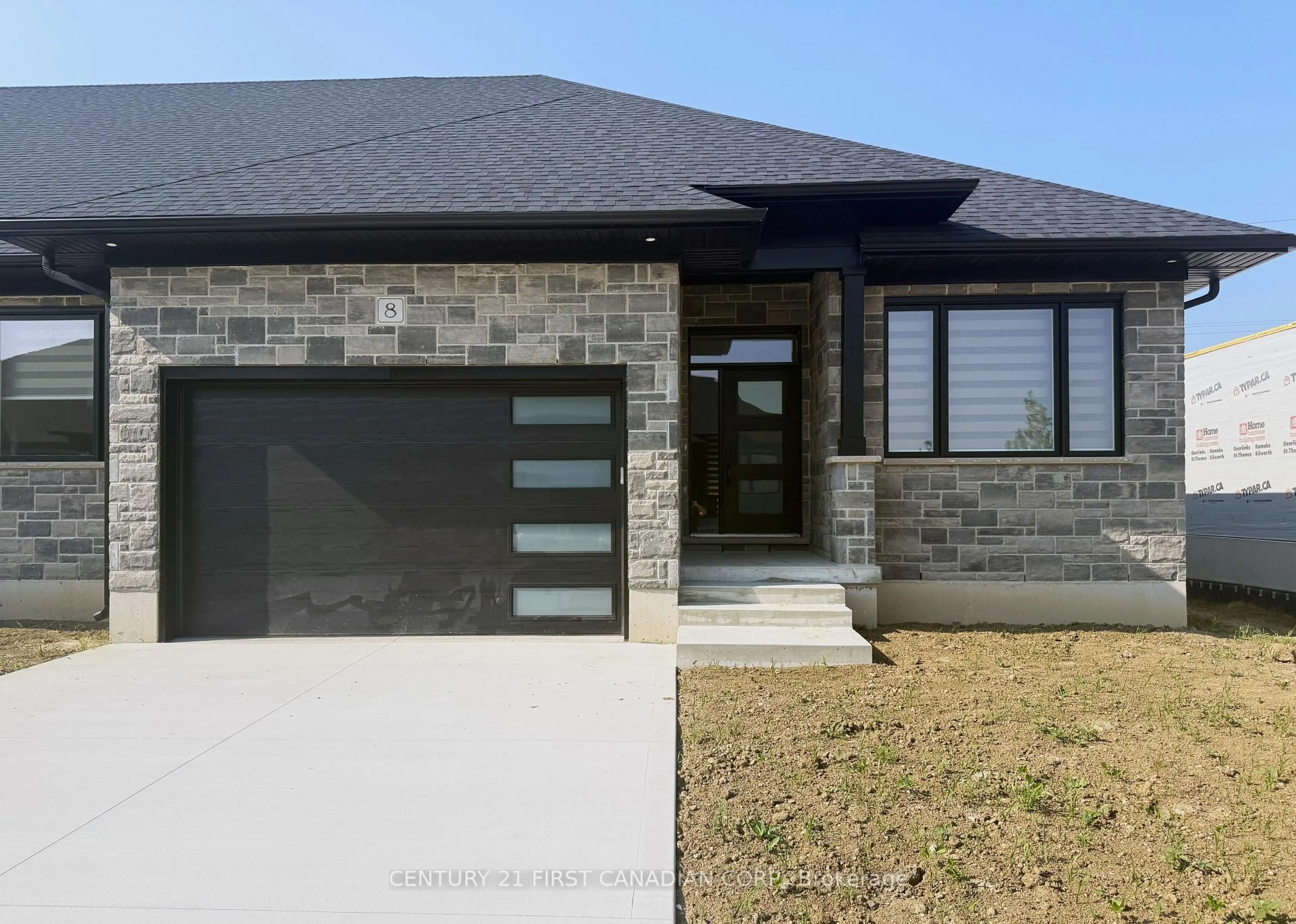 Home with brick exterior material, street for 32 Postma Cres #8, North Middlesex Ontario N0M 1A0