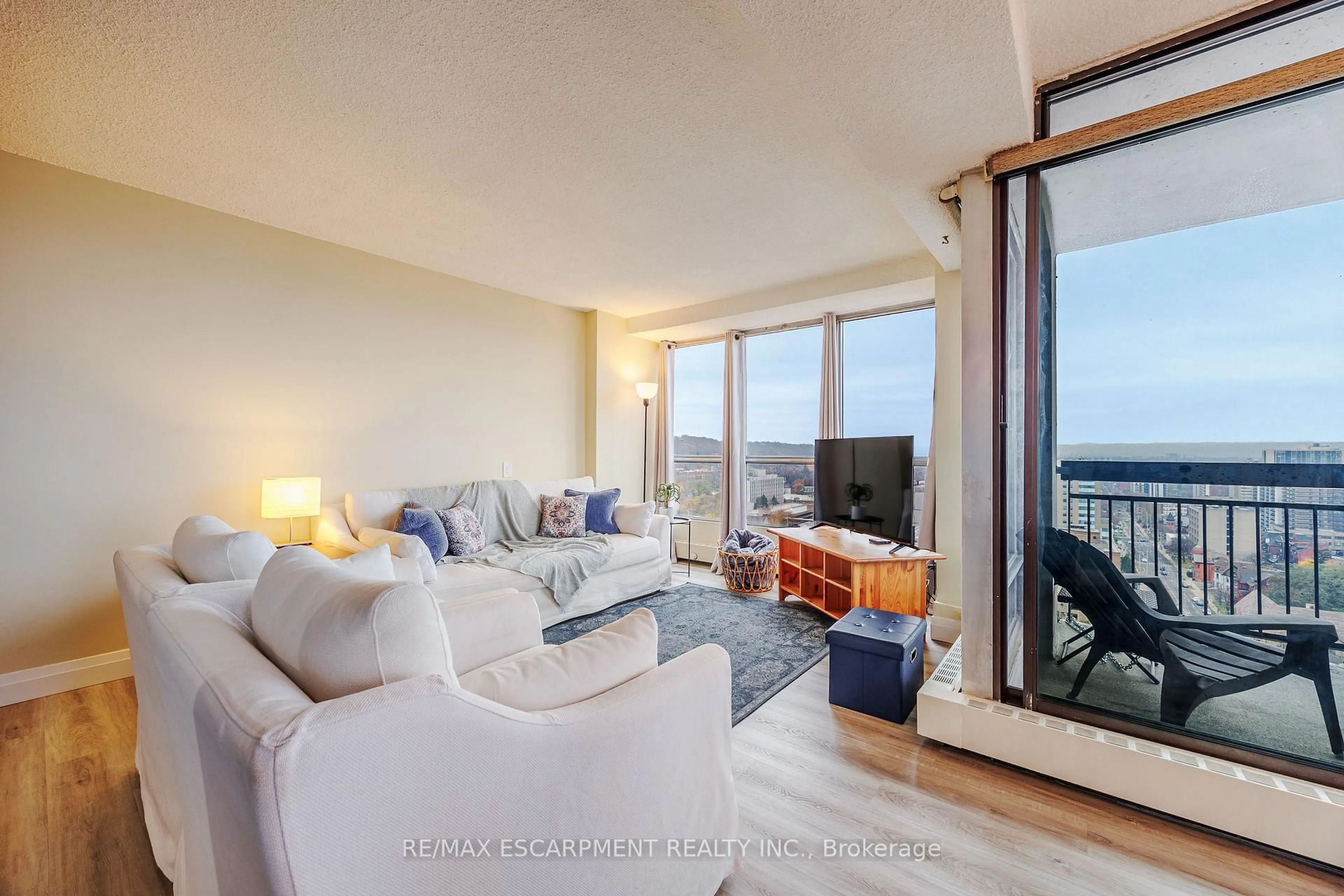 Living room with furniture, unknown for 150 Charlton Ave #2604, Hamilton Ontario L8N 3X3