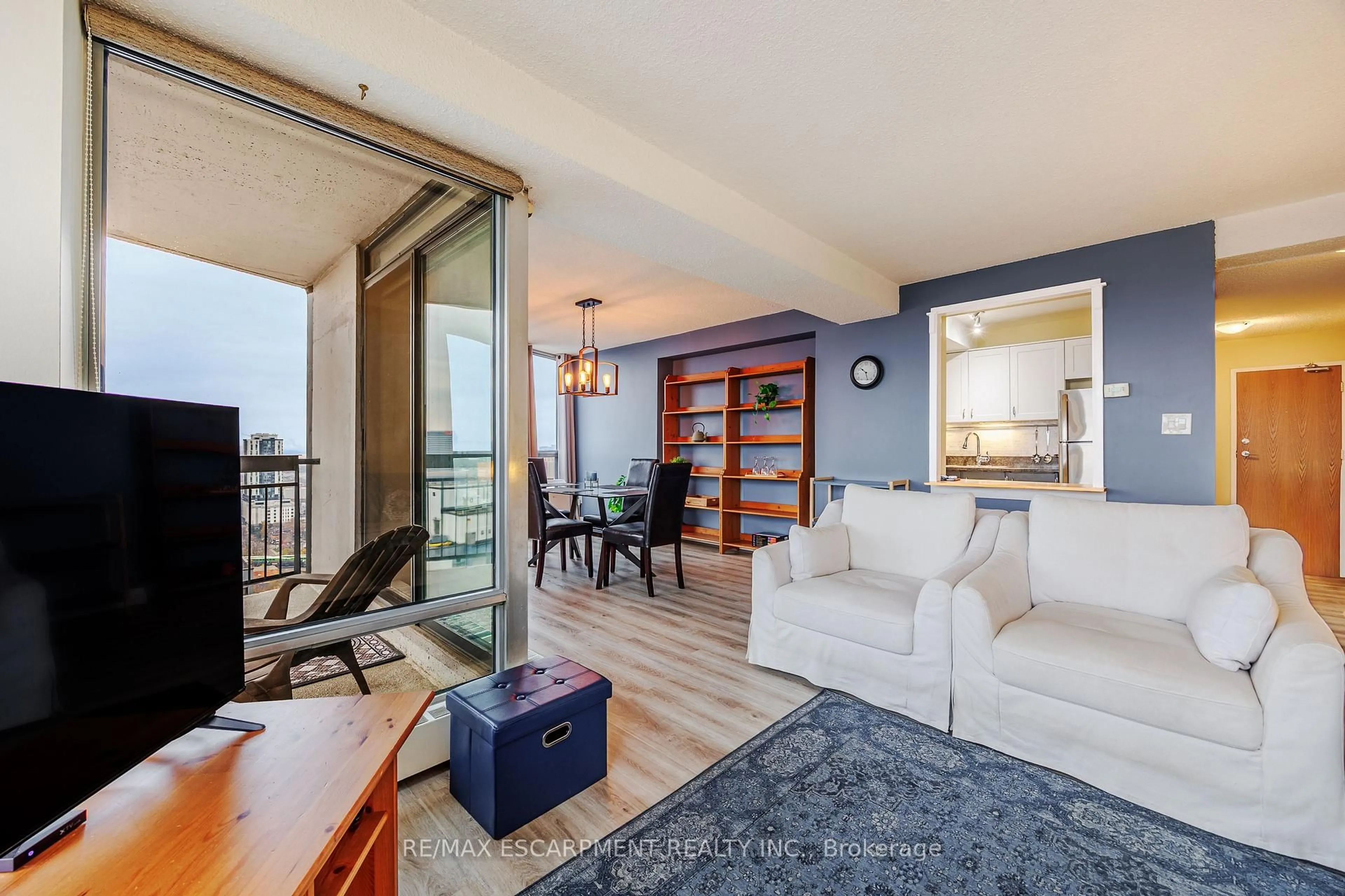 Living room with furniture, unknown for 150 Charlton Ave #2604, Hamilton Ontario L8N 3X3