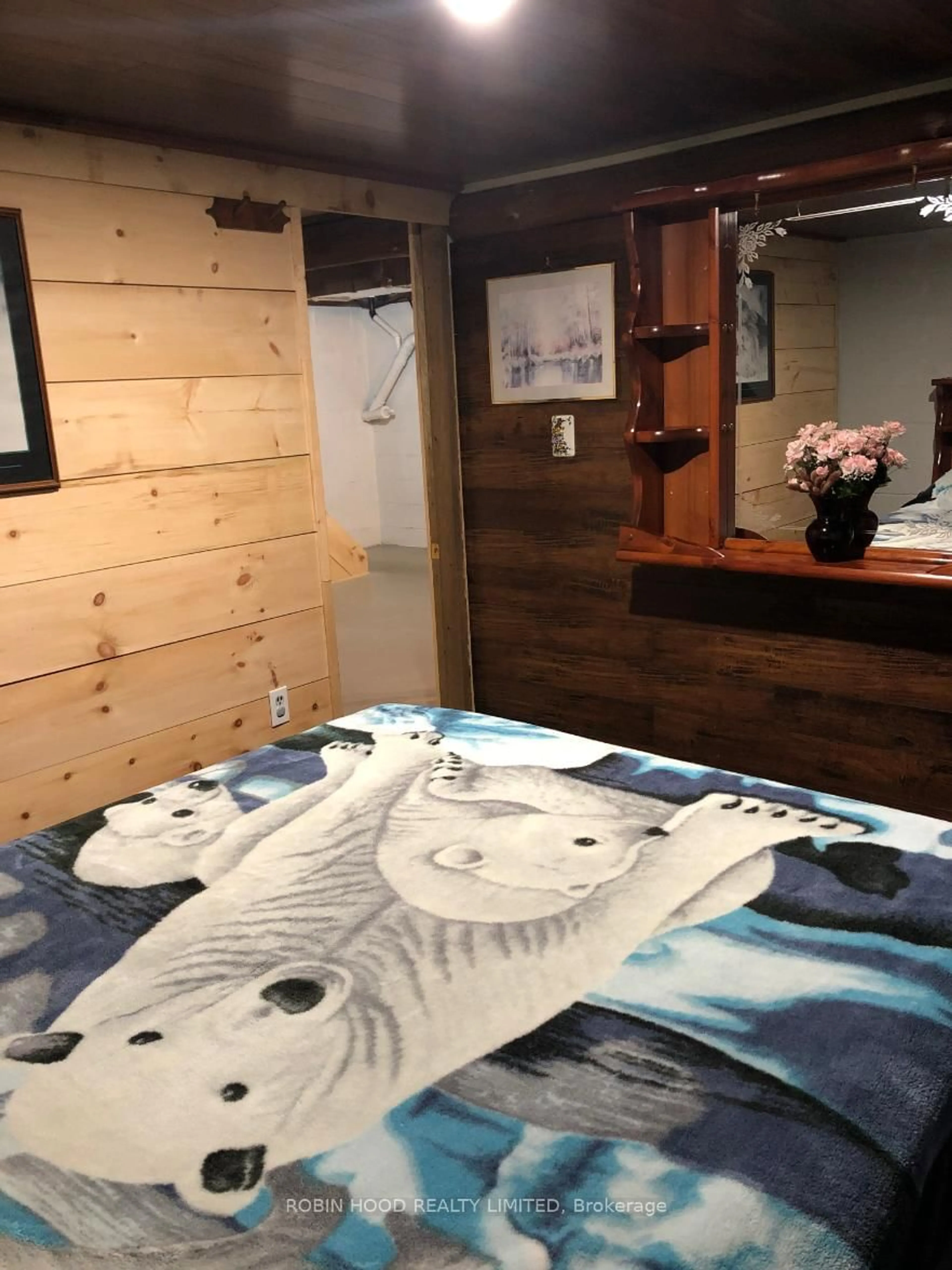 Bedroom with bed, wood/laminate floor for 421 Peggs Mountain Rd, Ryerson Ontario P0A 1C0