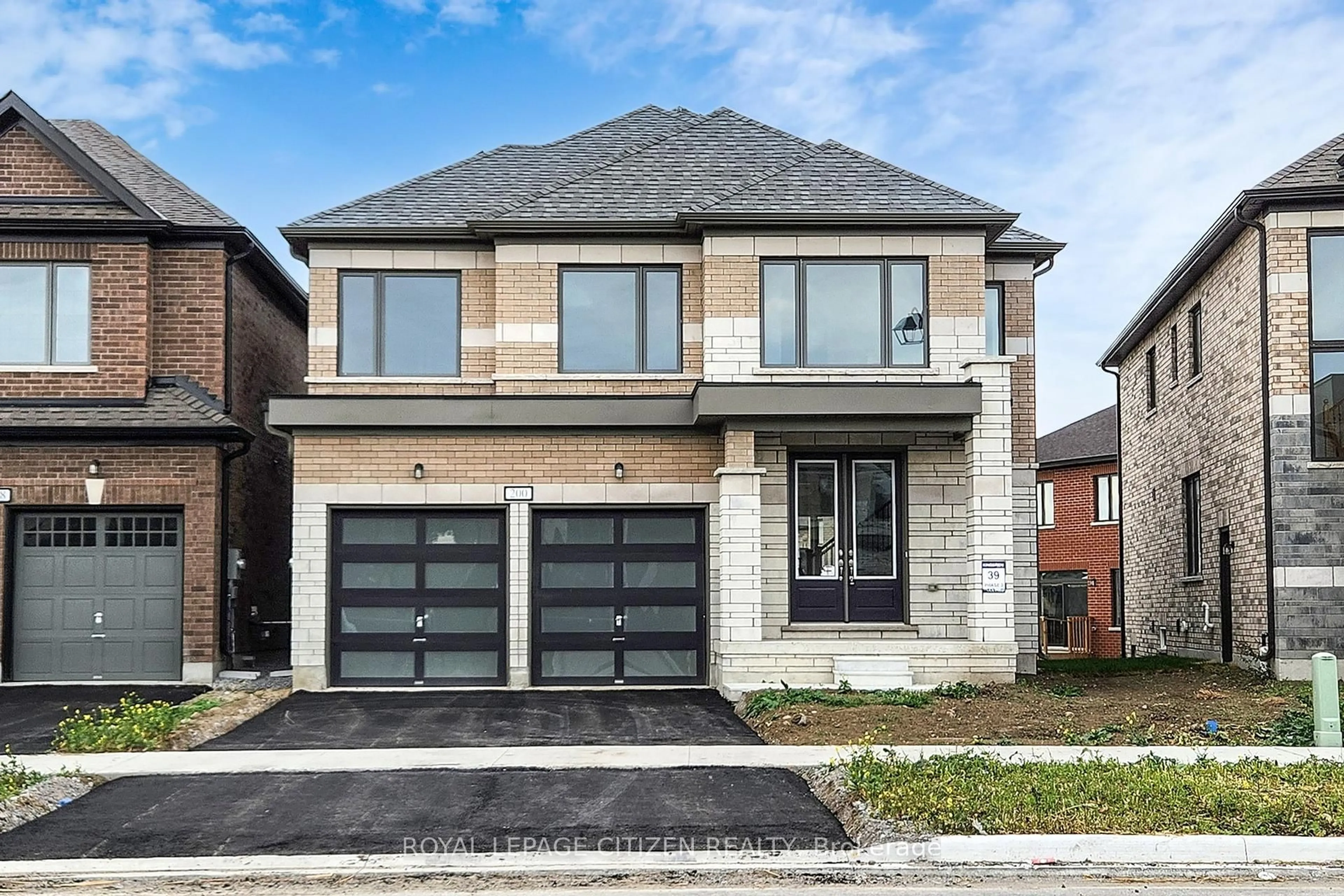 Home with brick exterior material, street for 200 St. Joseph Rd, Kawartha Lakes Ontario K9V 6A9