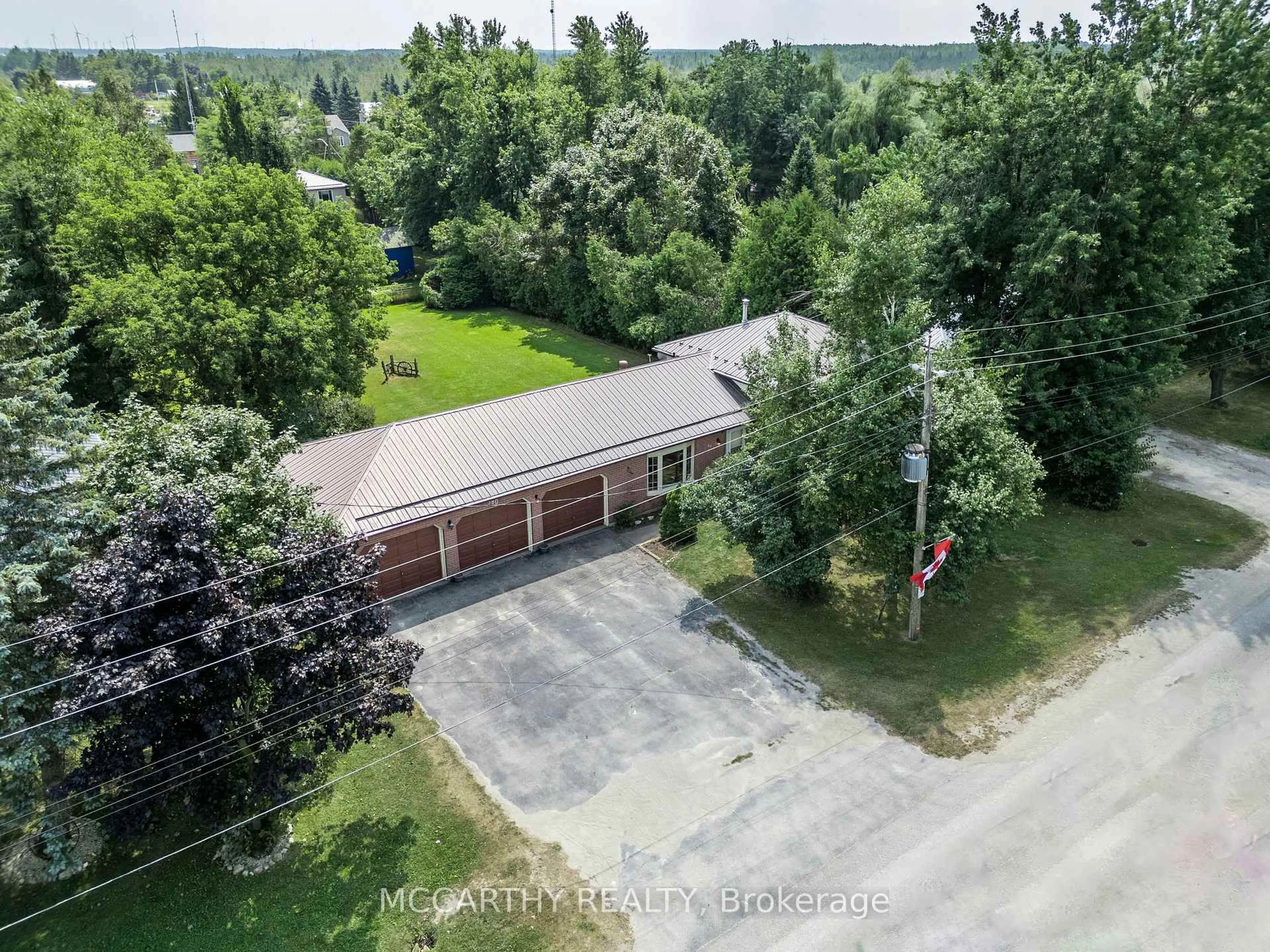A pic from outside/outdoor area/front of a property/back of a property/a pic from drone, unknown for 380 Main St, Southgate Ontario N0C 1B0