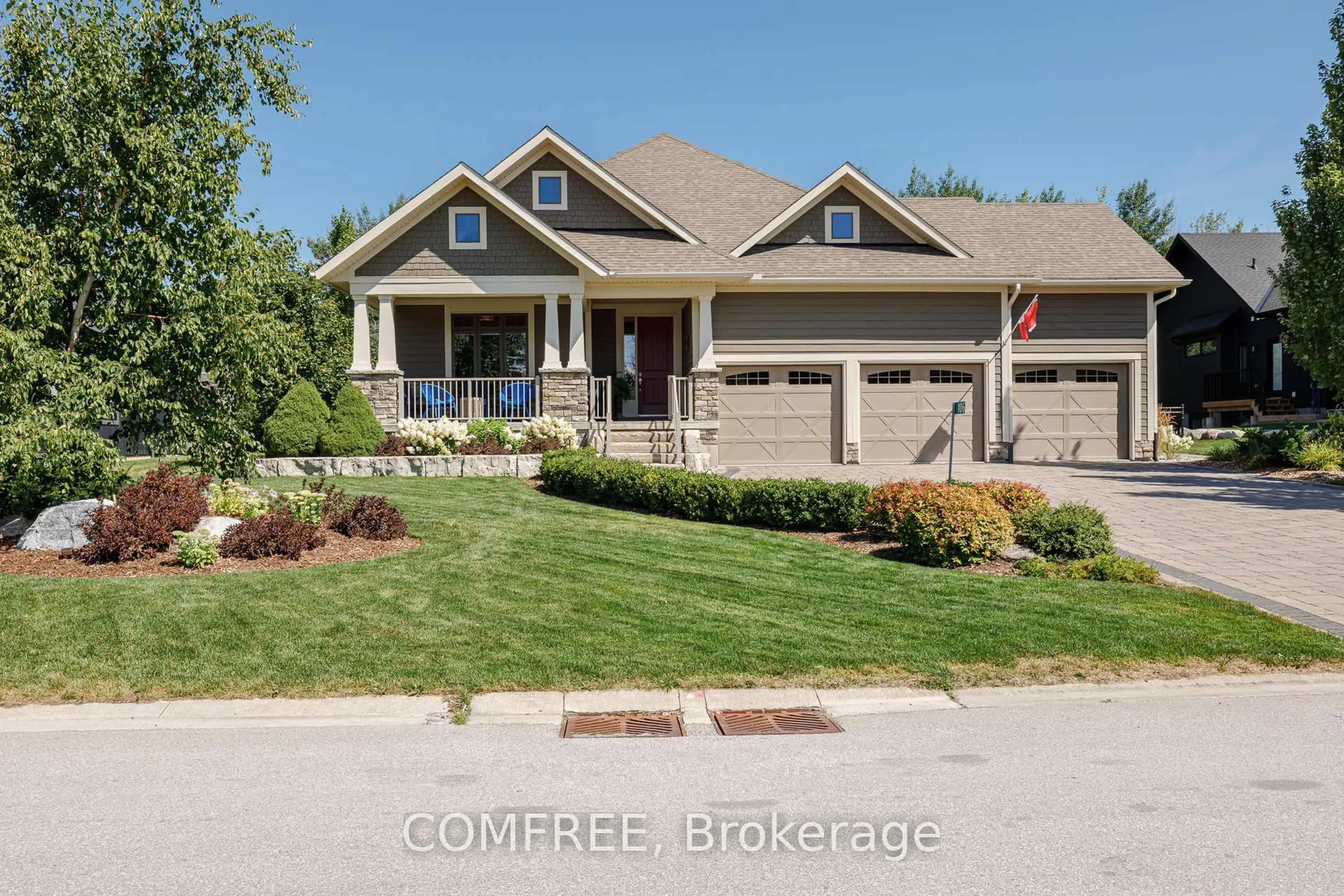 Home with brick exterior material, street for 106 High Bluff Lane, Blue Mountains Ontario N0H 2P0