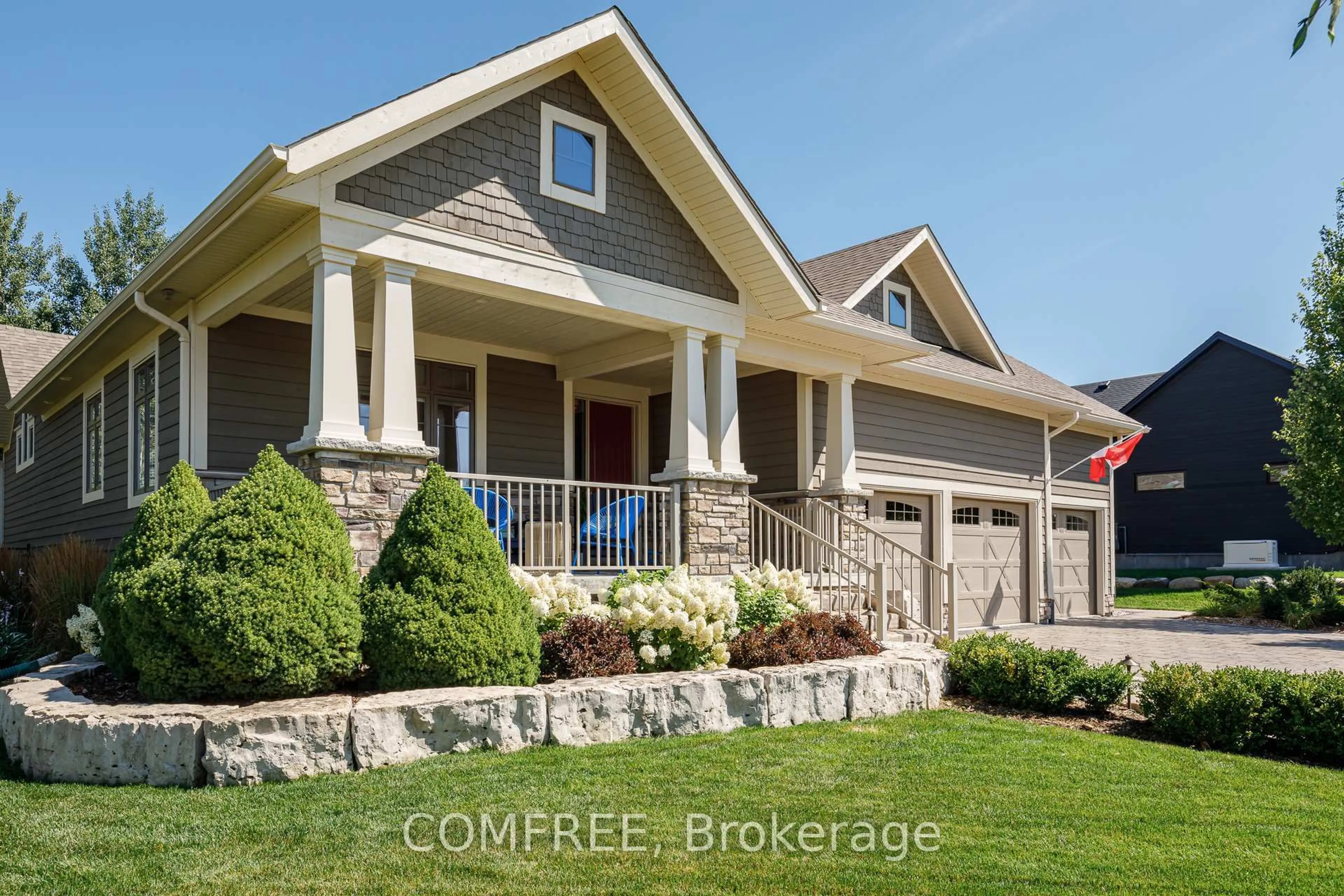 Home with brick exterior material, street for 106 High Bluff Lane, Blue Mountains Ontario N0H 2P0