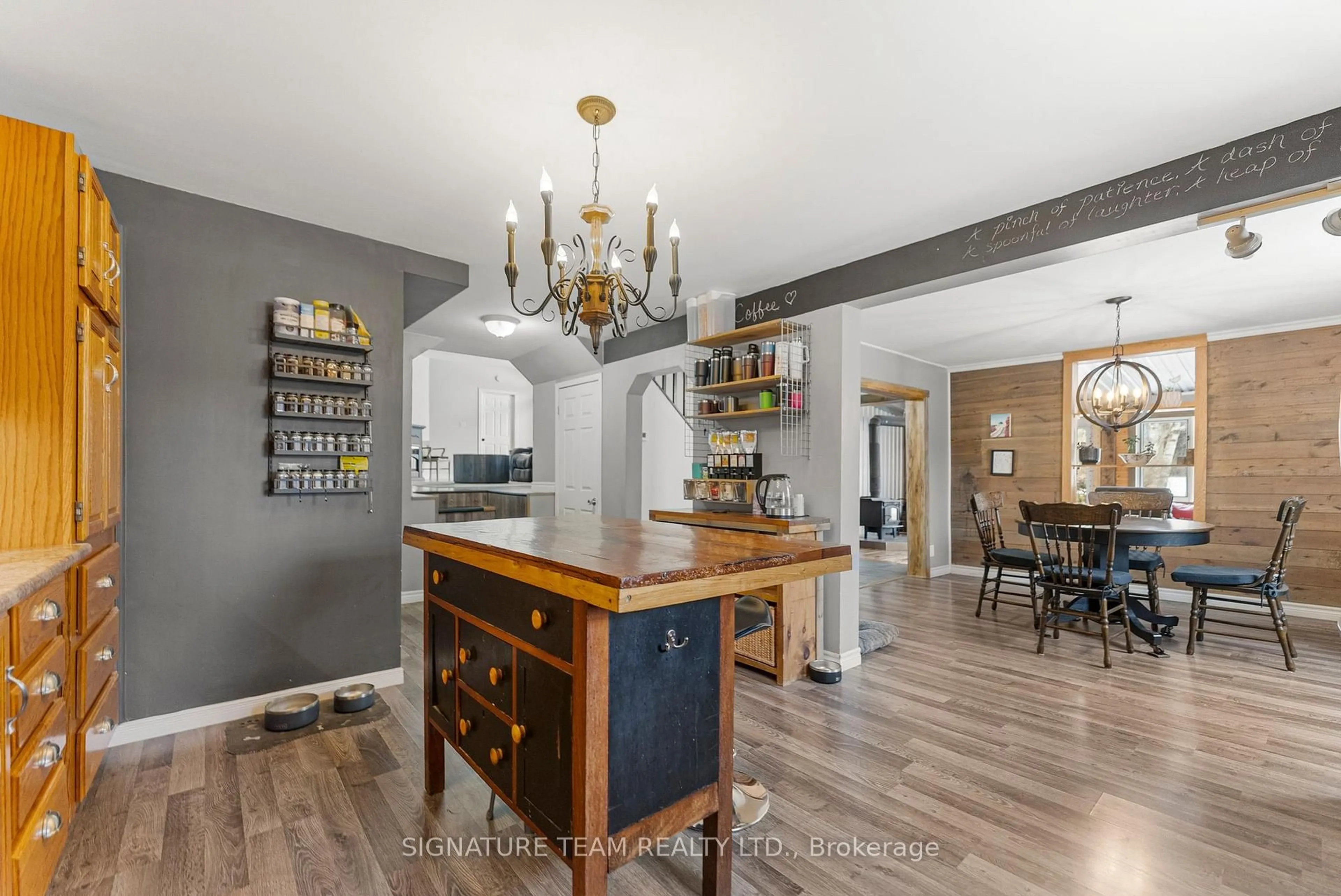 Open concept kitchen, wood/laminate floor for 1485 Eady Rd, Renfrew Ontario K7V 3Z8