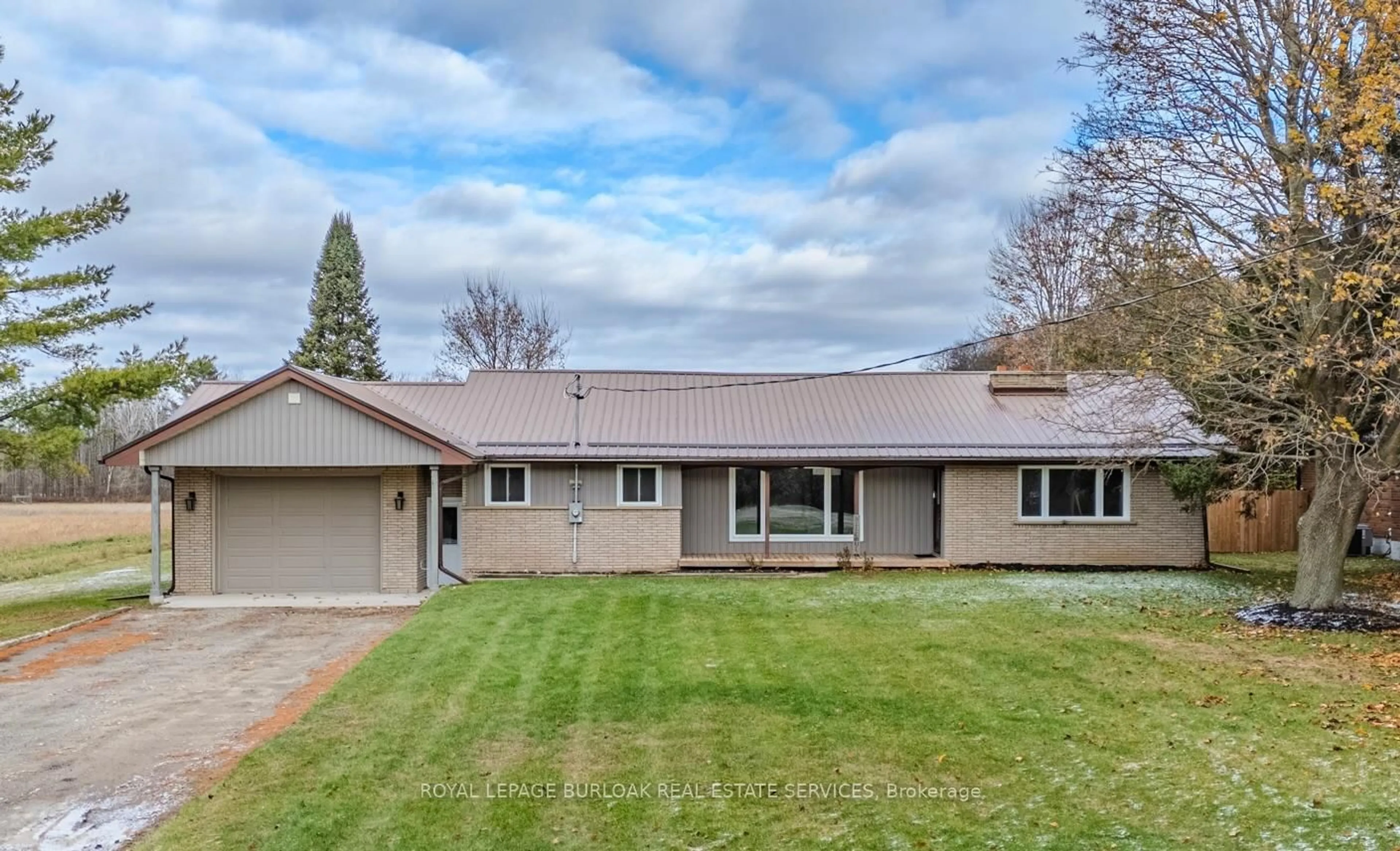 Home with vinyl exterior material, street for 56 Eleventh Concession Rd, Brant Ontario N0E 1E0